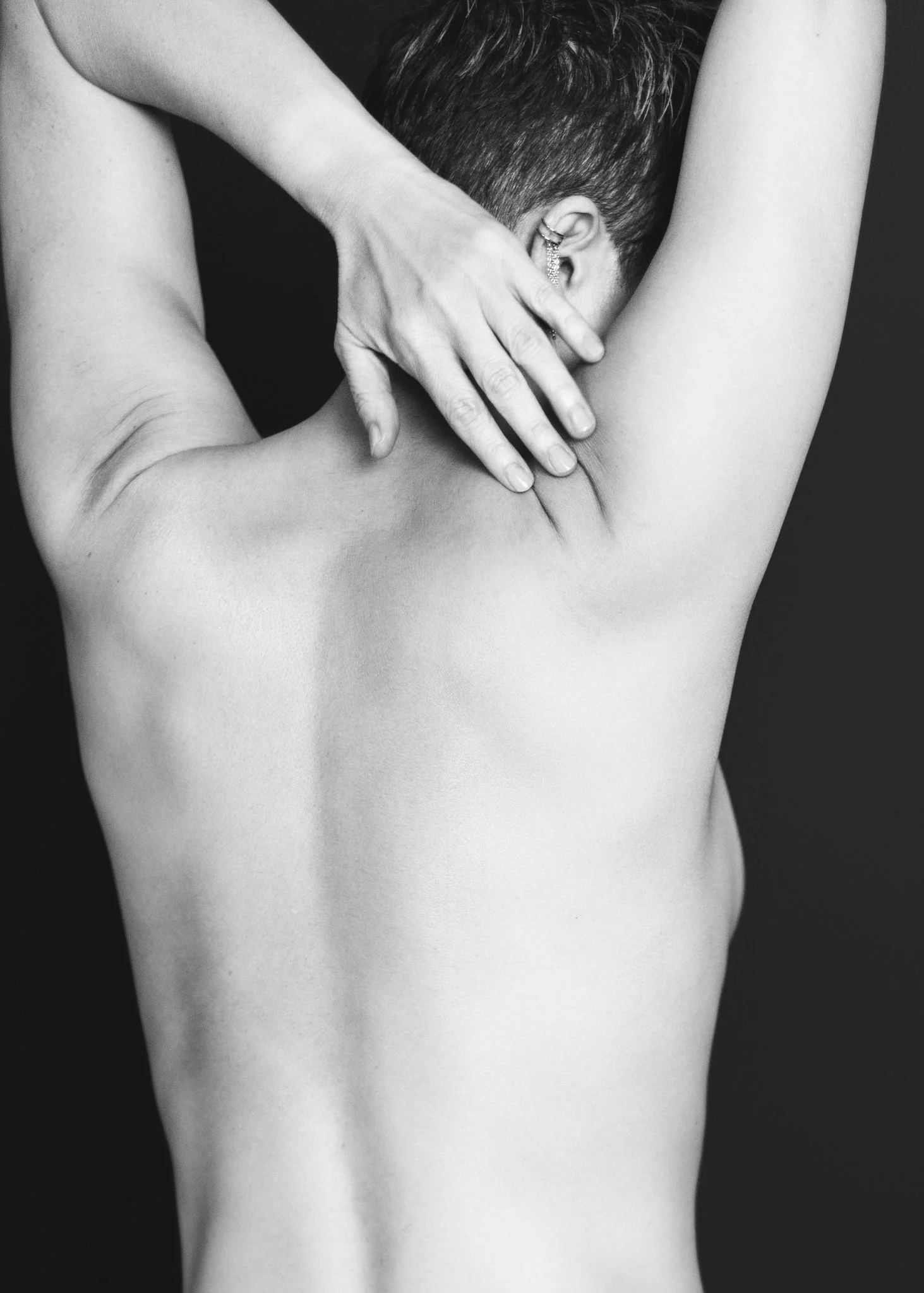 Black and White photo of a woman's back