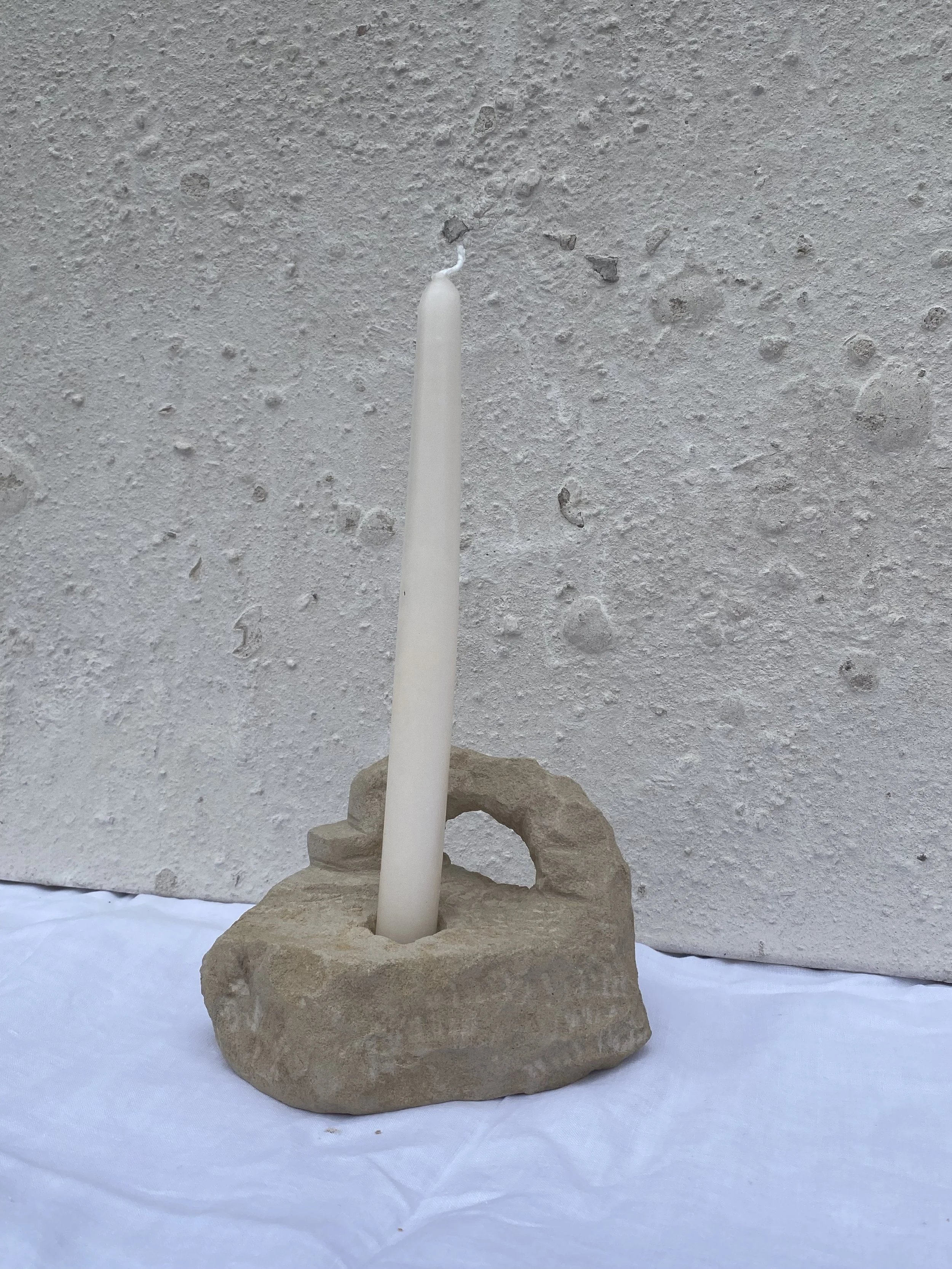 'Single Candle Holder' Limestone, 2026. Please seek A New Tribe's website for more details. 