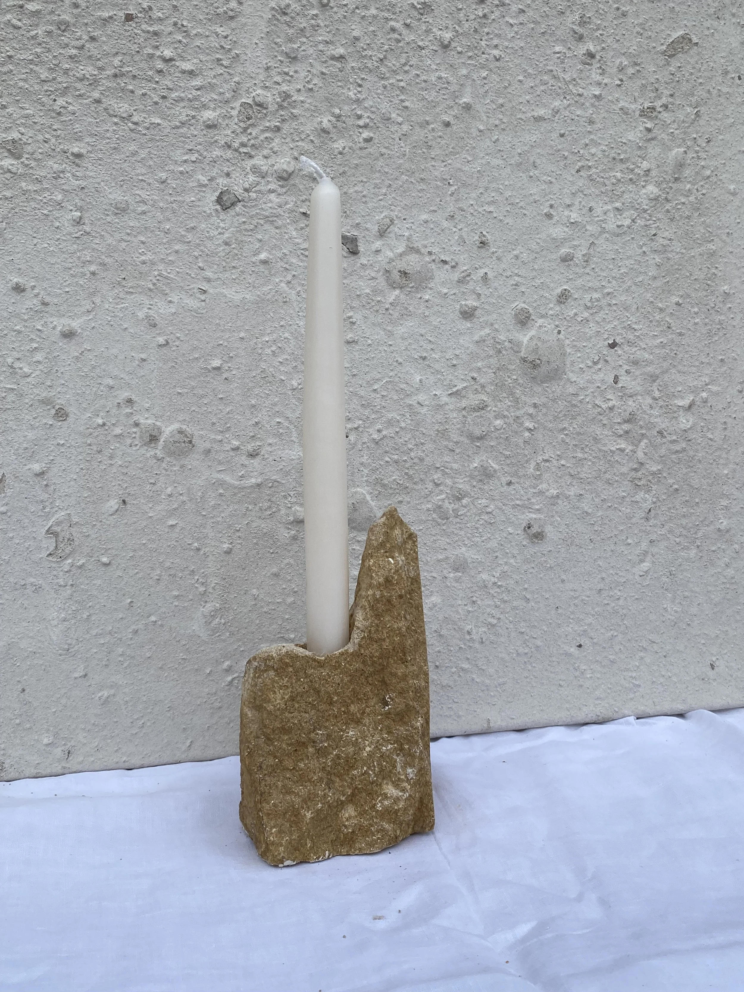 'Single Candle Holder' Limestone, 2026. Please seek A New Tribe's website for more details. 