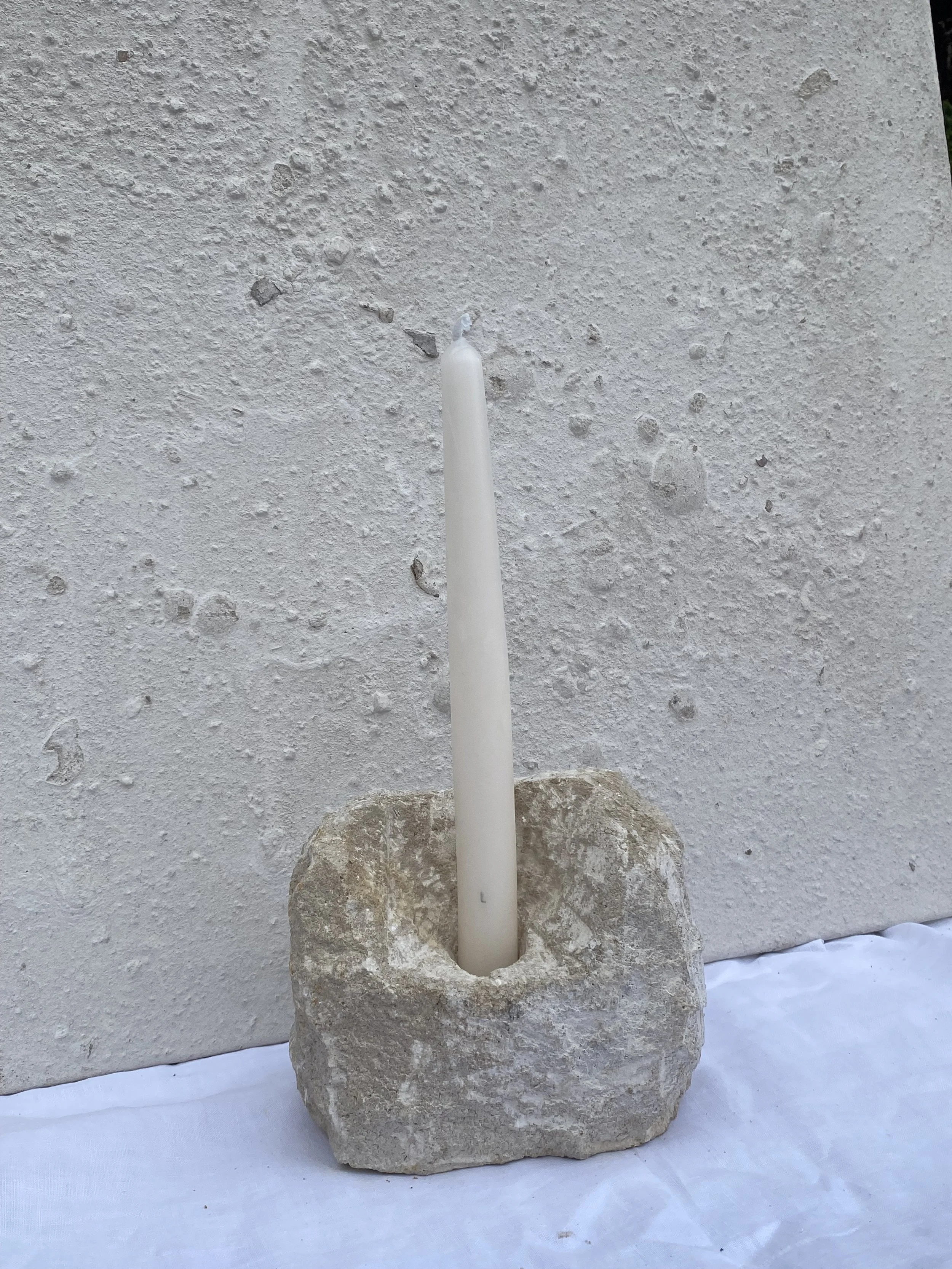 'Single Candle Holder' Limestone, 2026. Please seek A New Tribe's website for more details. 