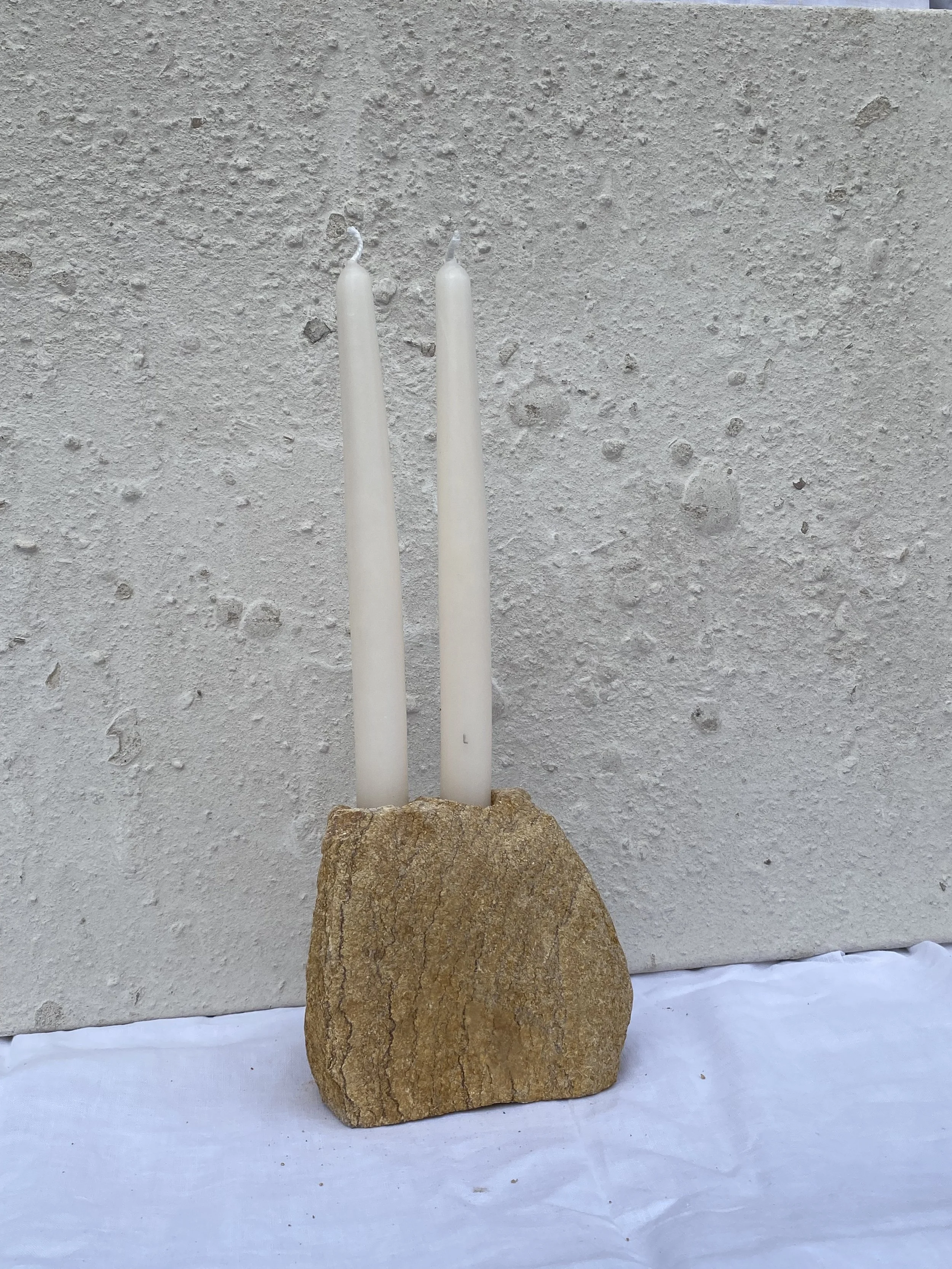 'Double Candle Holder' Hamstone, 2026. Please seek A New Tribe's website for more details. 