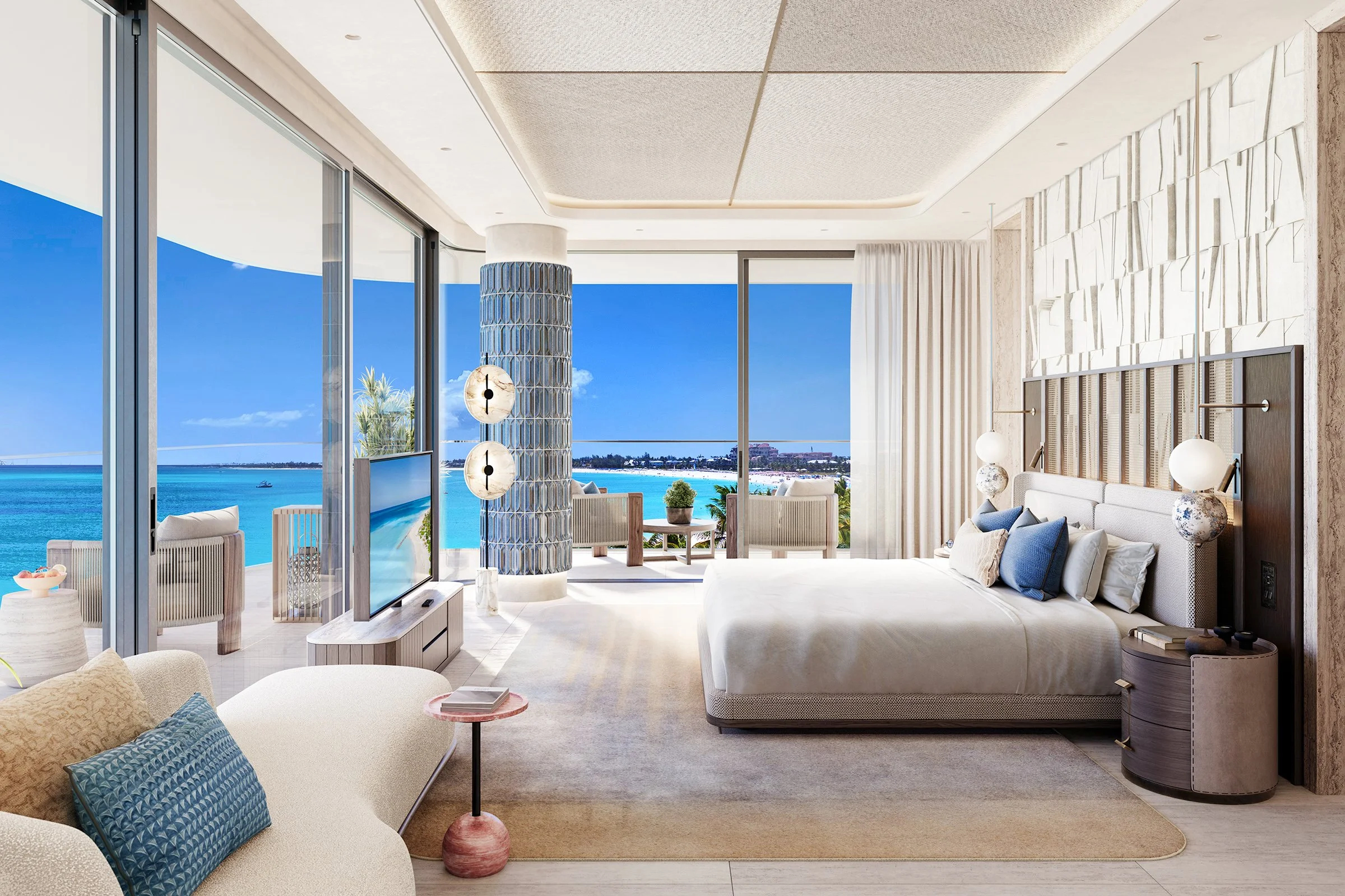 Modern living room with large glass windows offering a view of the ocean and blue sky, decorated with white and blue furniture, and a textured wall.