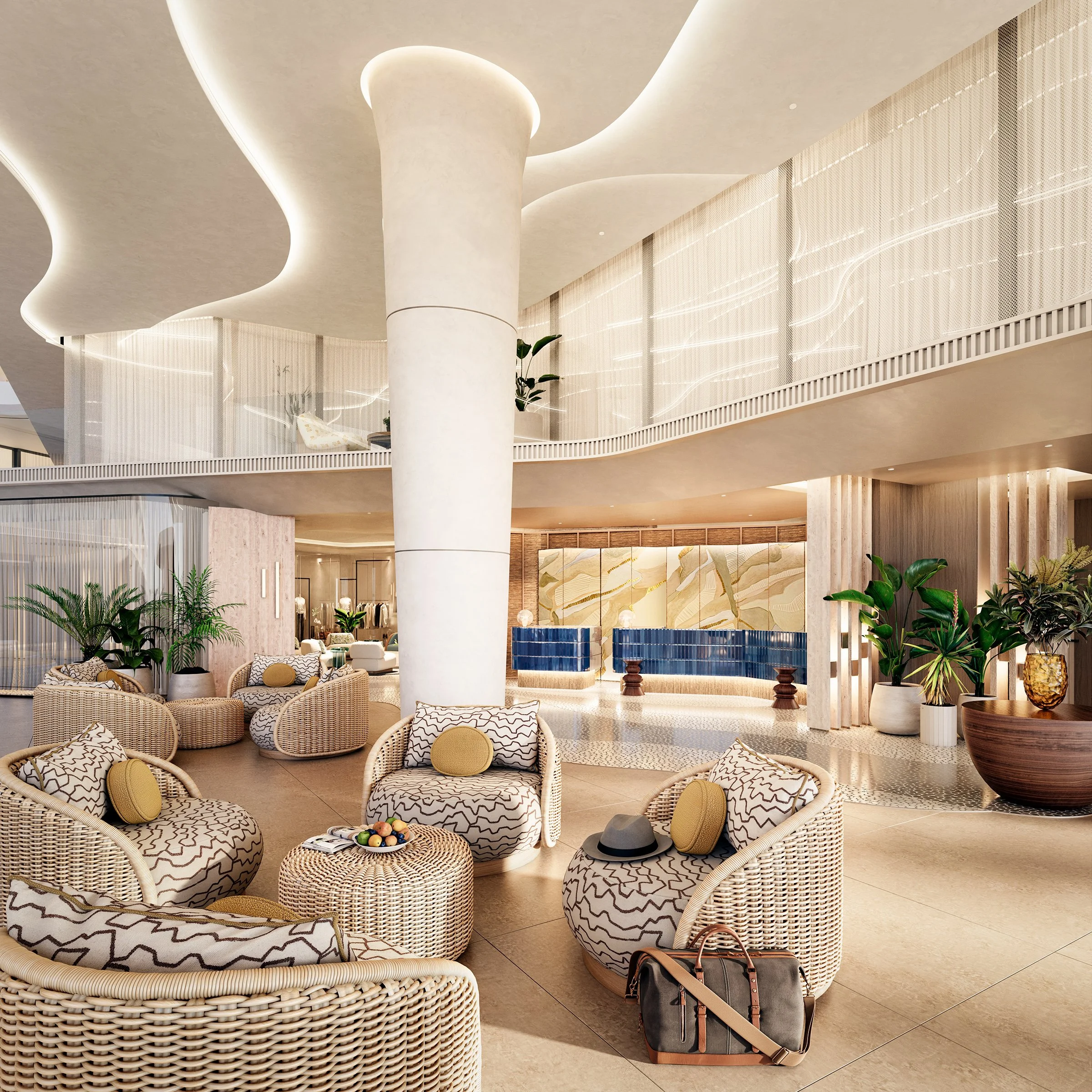 Interior of a modern, stylish hotel lobby or lounge with white wicker furniture, pillows, a small round coffee table with a bowl of colorful fruit, and lush green plants. There are architectural features such as curving ceiling designs, large columns, and decorative screens with lighting. A travel bag and a hat are placed on the floor next to the furniture.