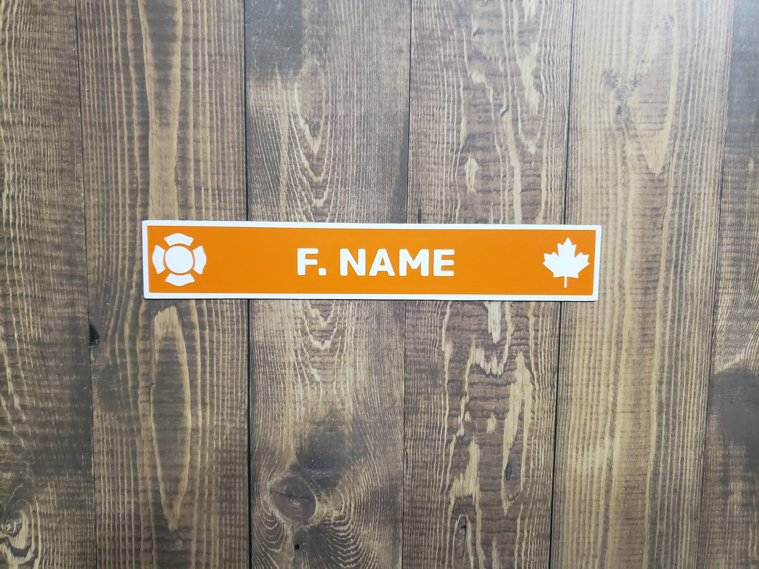 Firefighter Magnetic Name Plate | Fits Ready Rack Plastic Holders | Maltese Cross & Maple Leaf | 6 x 1 inches | Orange on White