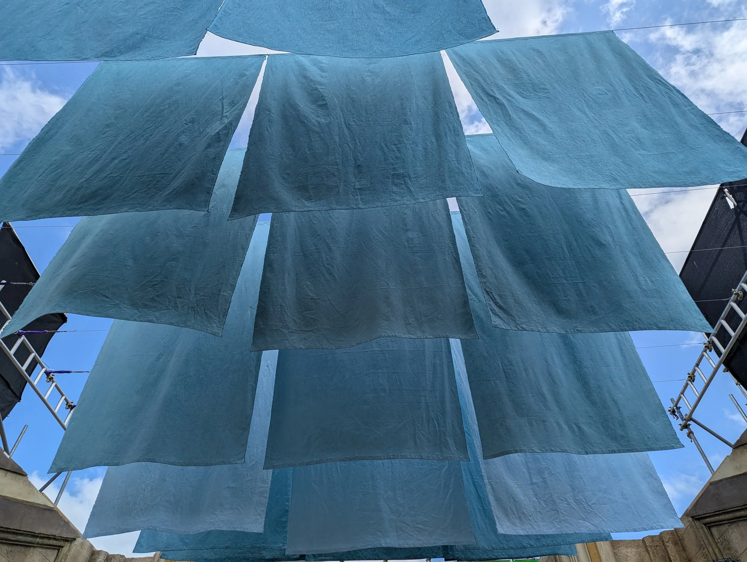 Alan Brooker Drapes, dyed flag display for castle entrance 'Masters of the Universe'