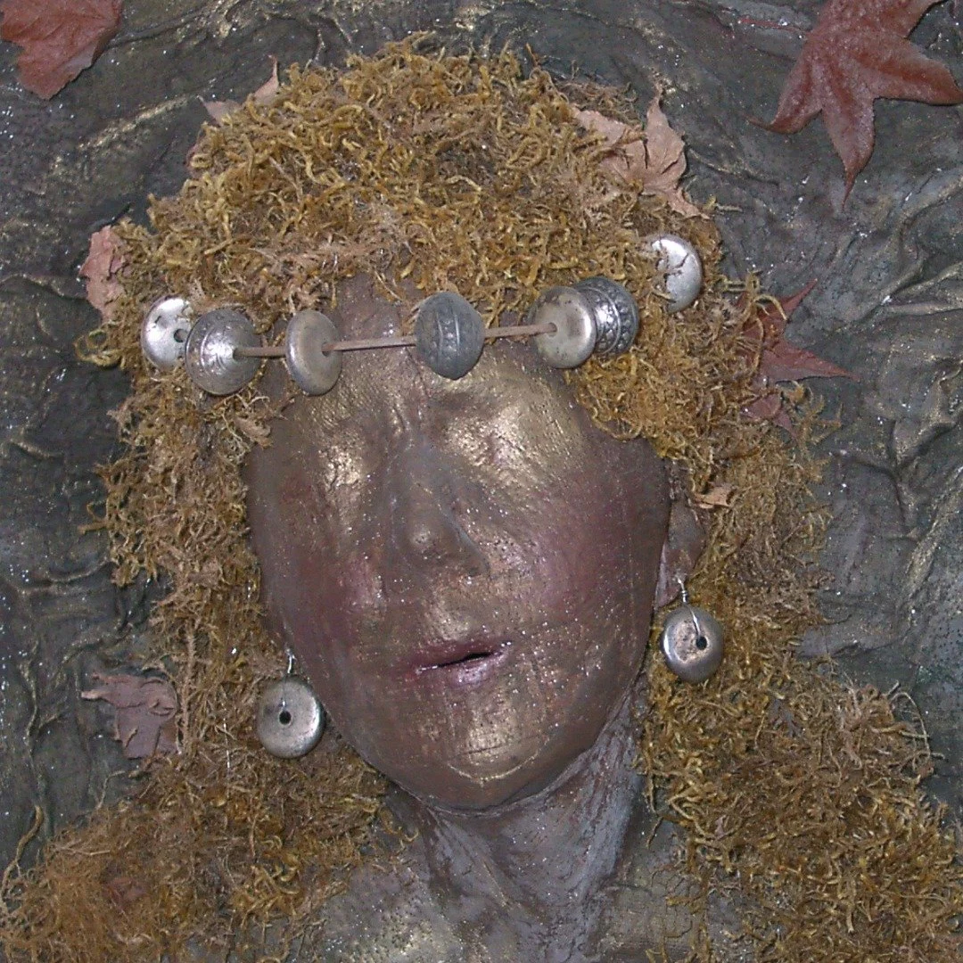 A mask I made years ago&mdash;plaster gauze, moss, autumn leaves, and a crown of silver baubles. Still one of my favorites. And even though today is Beltane, her opposite in a sense, she's on my mind.

I wrote a piece on Substack today about masks, a