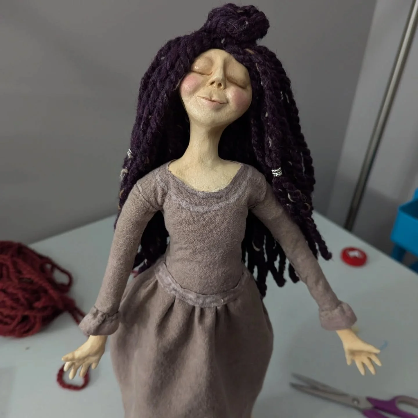 She's trying out this hairstyle. What do you think, is she a top-not kind of gal?!