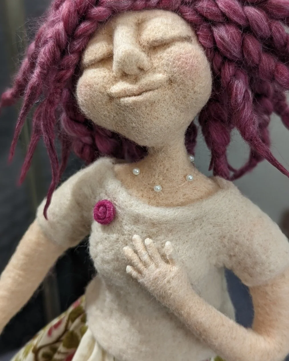This little spirit doll just makes me smile. The pink hair, the hand on her heart, the content expression on her face. She looks like she knows something real about herself, the world&hellip; and maybe where her heart fits into it.

I love making dol