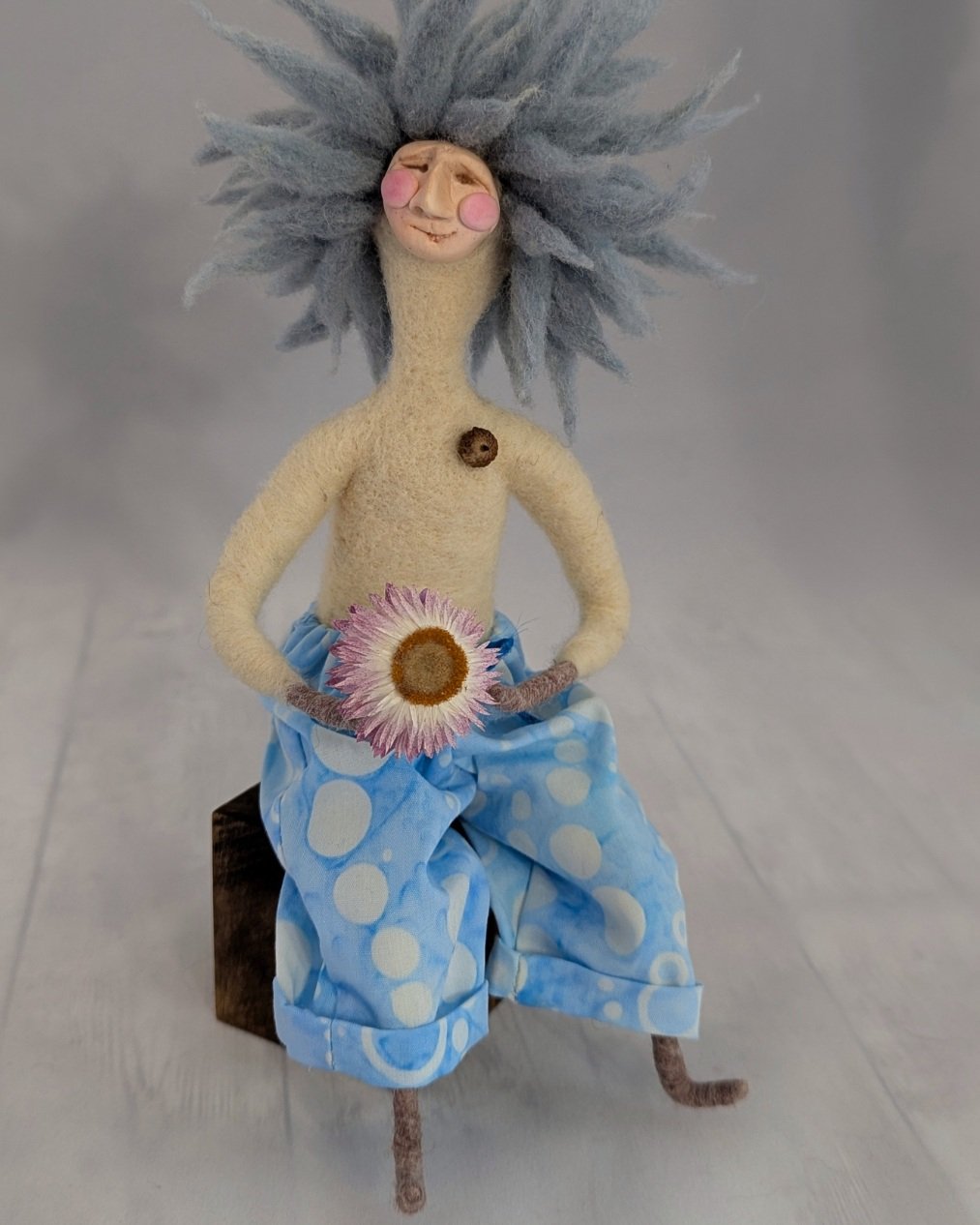 Meet the one who did not brush his hair this morning and has zero regrets about it.

I love a good wonky face! This guy's face says, "Dude, live kowabunga." Yeah, he's super chill.

Some dolls have plans. This one might just be saying skip 