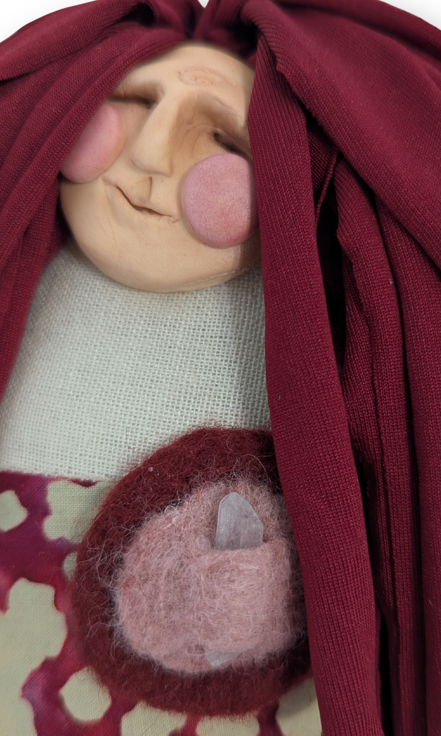 Close-up of Peaceful Warrior guardian doll face showing intricate handcrafted features and gentle expression