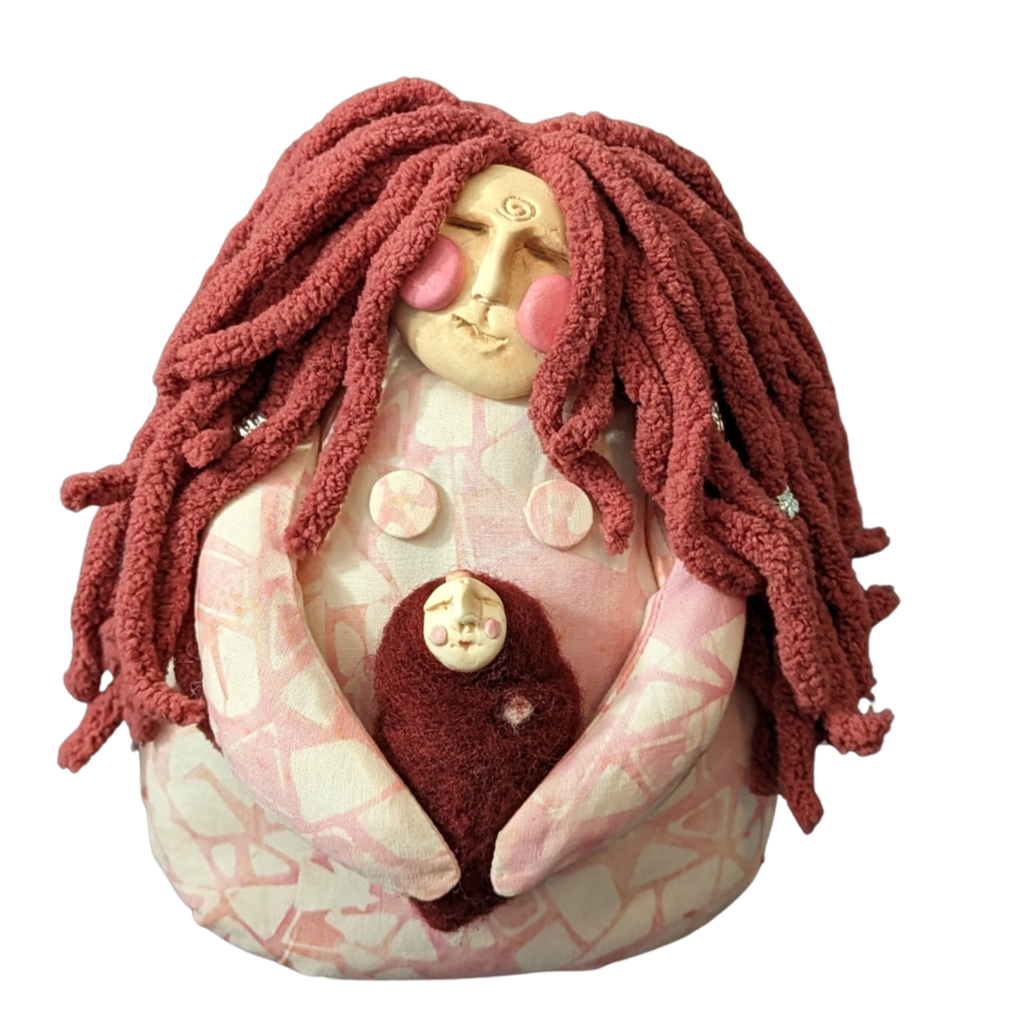 Handmade pink poppet doll holding a tiny baby spirit doll, with soft yarn hair and a gentle expression.