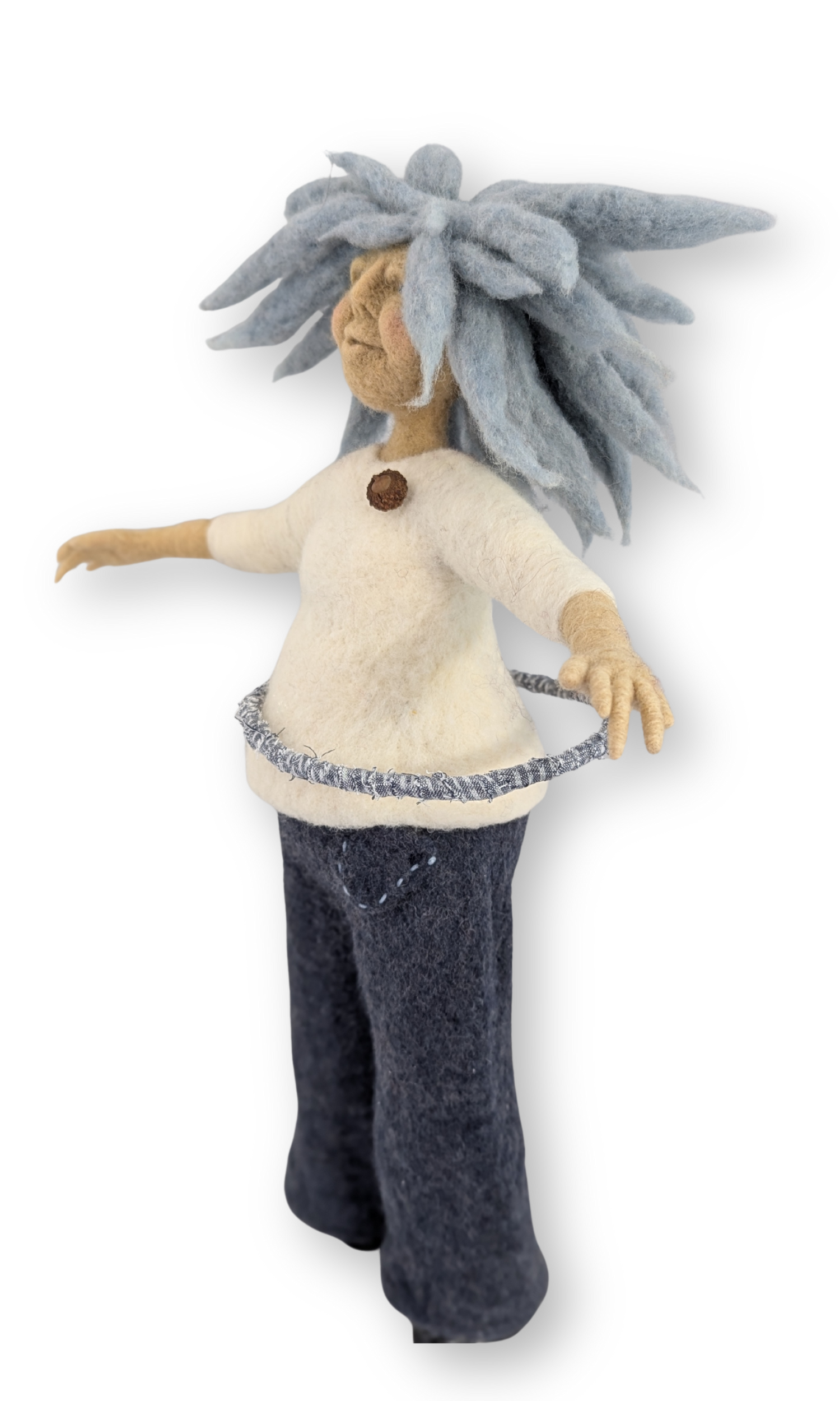 Side profile of the hula hoop guardian doll, showing playful stance and hoop.