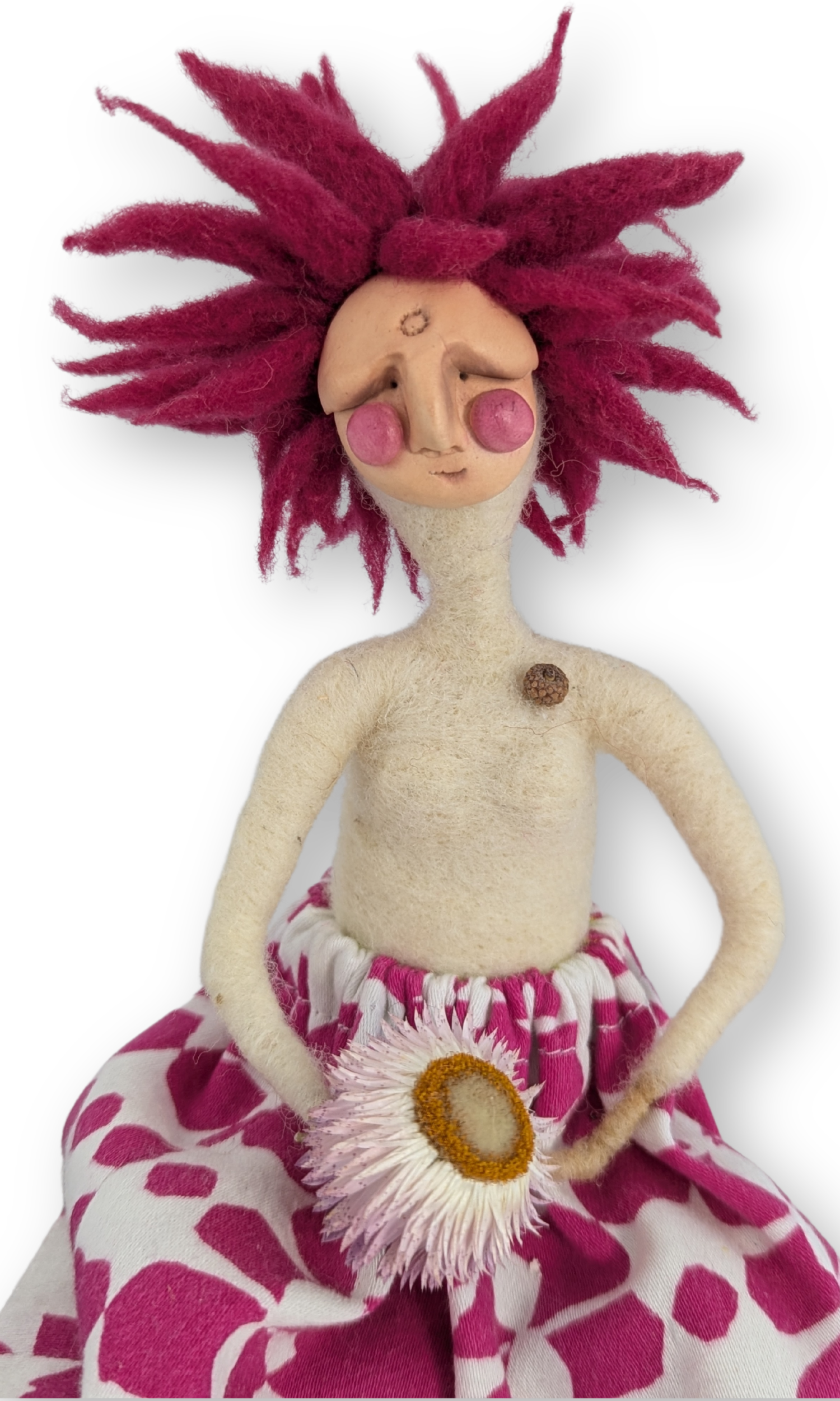 Close-up of Flower Power Guardian Doll’s face and flower, showing needle-felted details, clay features, and pink wool hair.