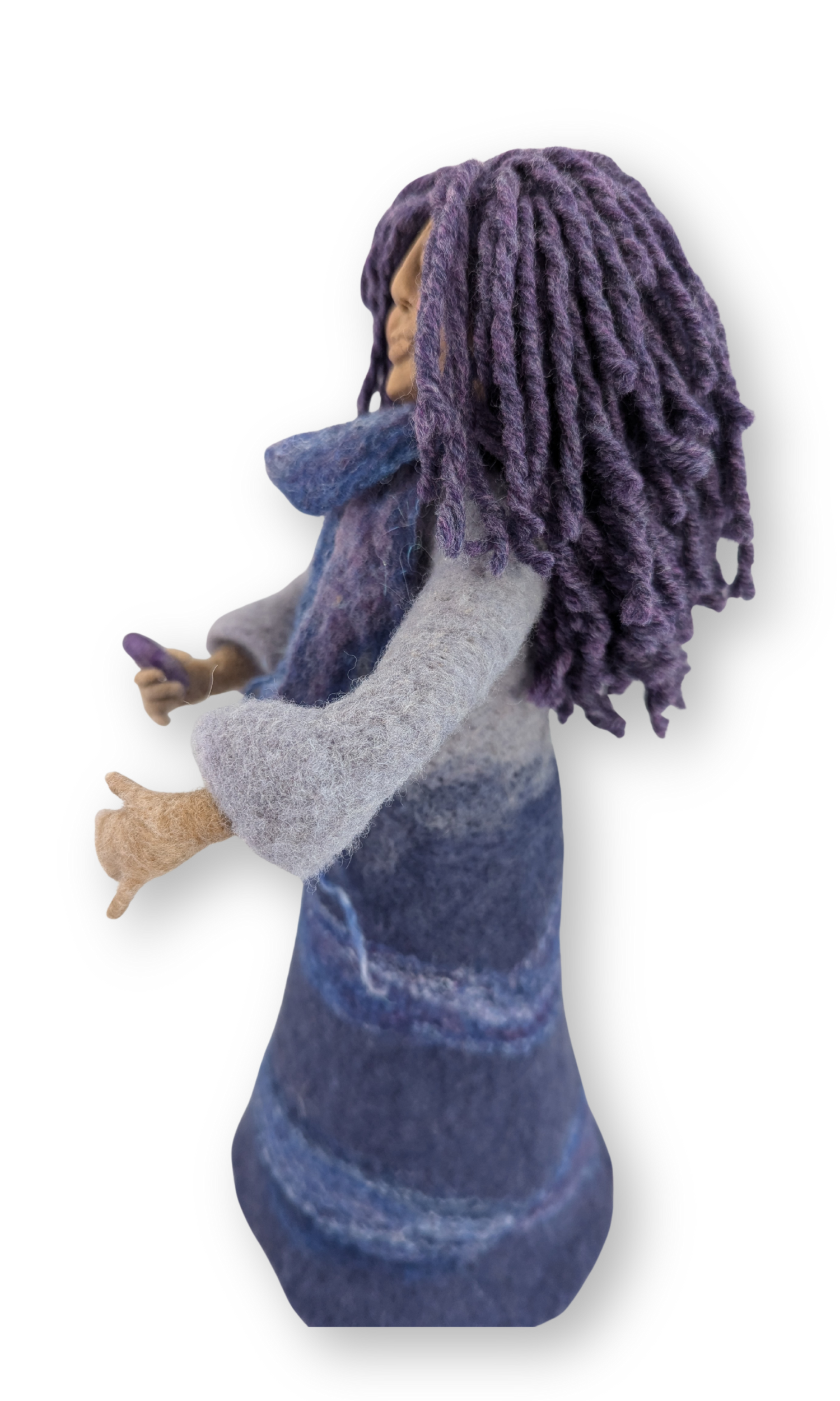 Side angle highlighting Priestess Guardian Doll’s flowing purple yarn hair and felted blue dress