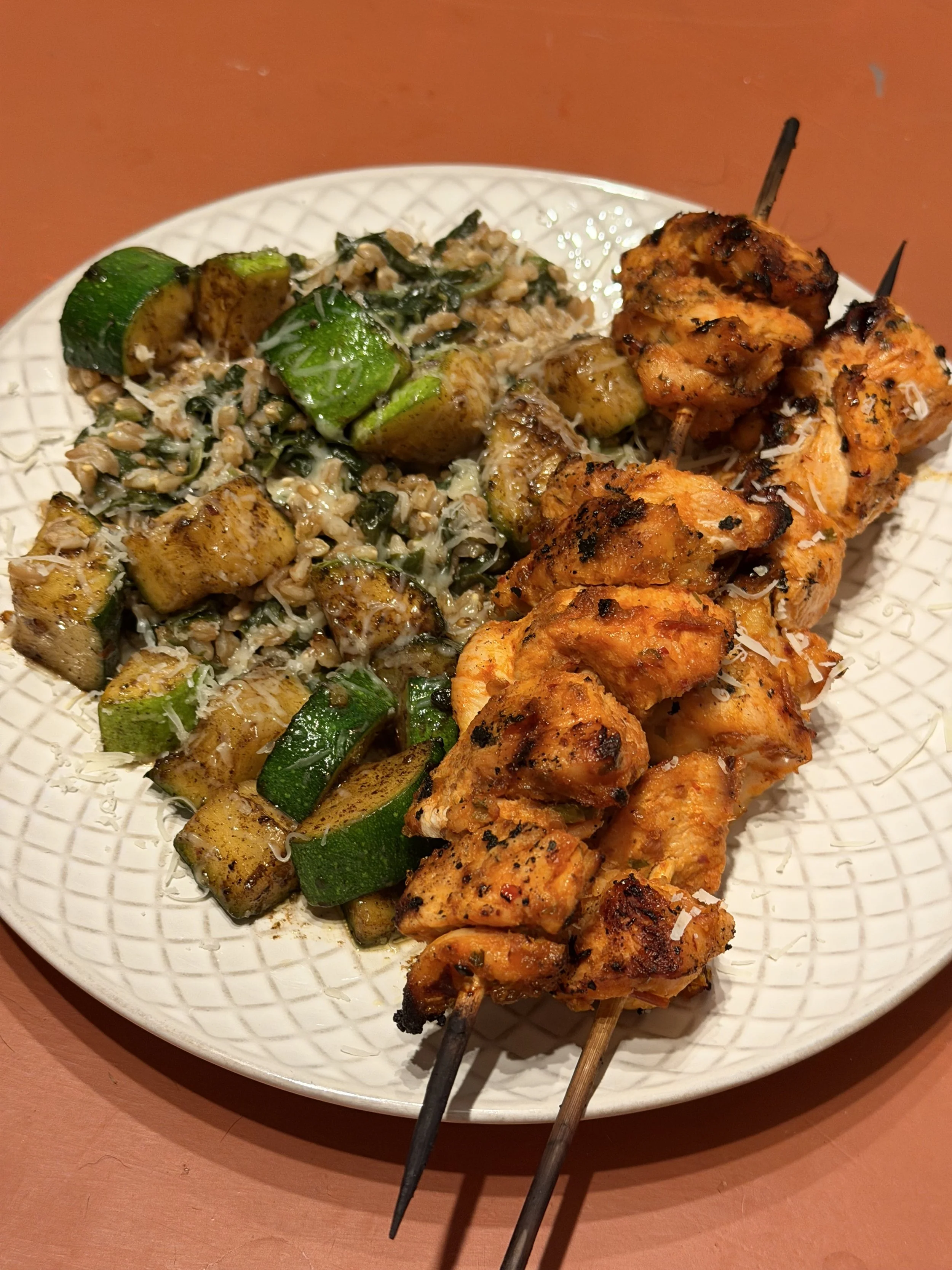 Harissa Chicken Skewers with Parmesan Basil Couscous & Zucchini