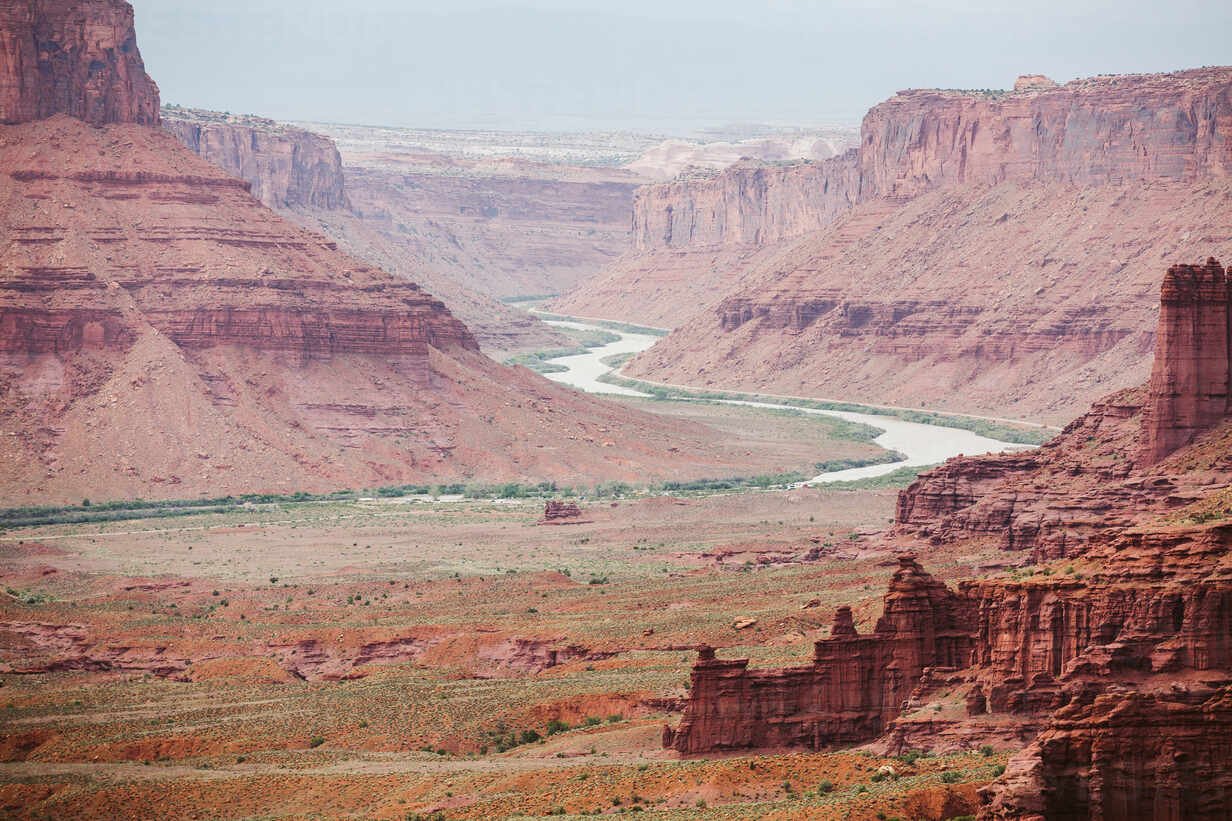 red-sandstone-canyon-walls-and-the-colorado-river-near-moab-utah-CAVF85869.jpg