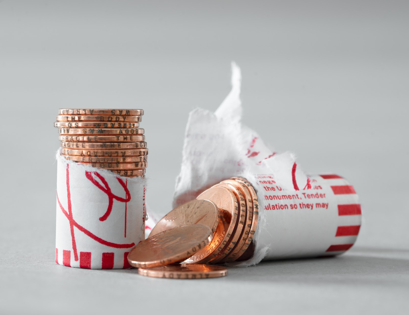Jill Magid, 'Tender Roll', 2020, single roll of 2020 edge-engraved U.S. pennies, custom-printed coin wrapper, 1 x 1 x 4 inches, photograph by Paul McGeiver, image courtesy of the artist, © Jill Magid