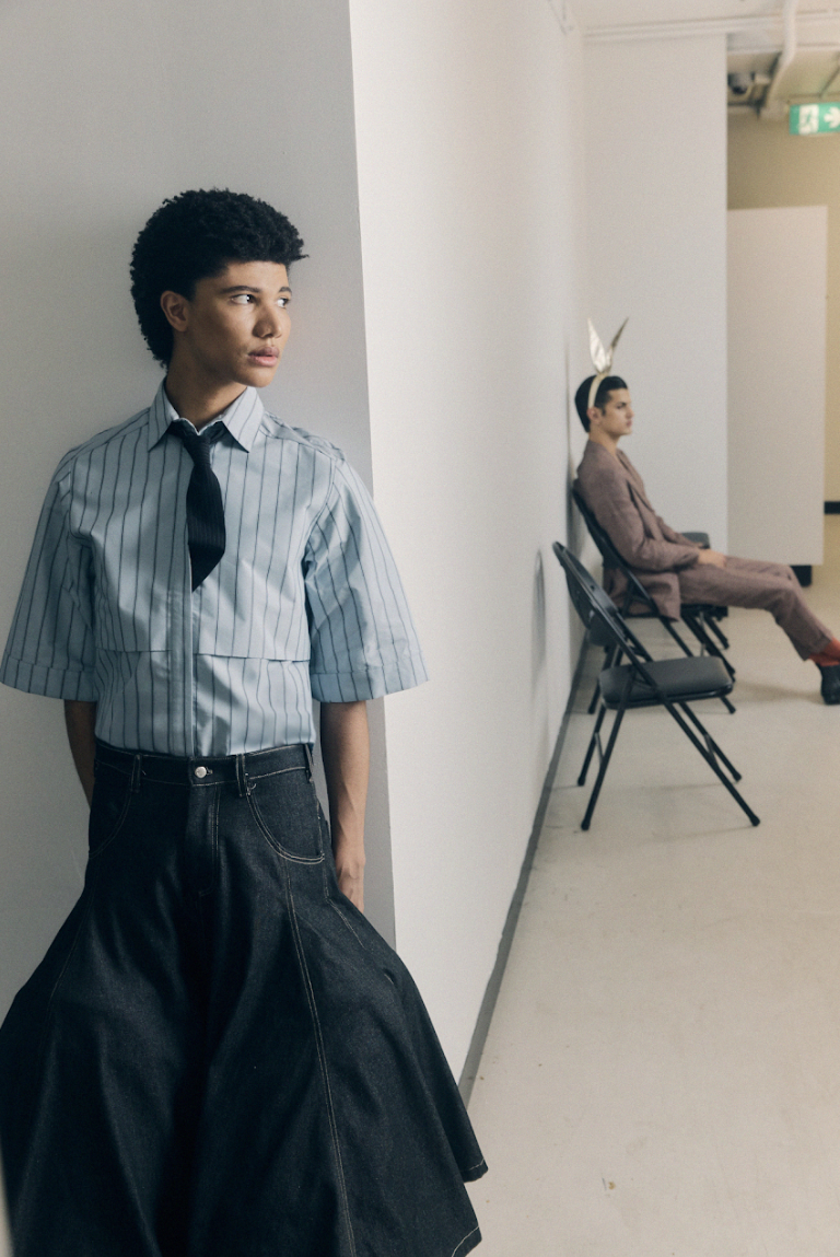 James wears Strateas Carlucci shirt and tie, Luke Friend shorts, Prada shoes and socks. Tom (right) wears Hugo Boss suit, Coach bunny ears, Prada shoes.