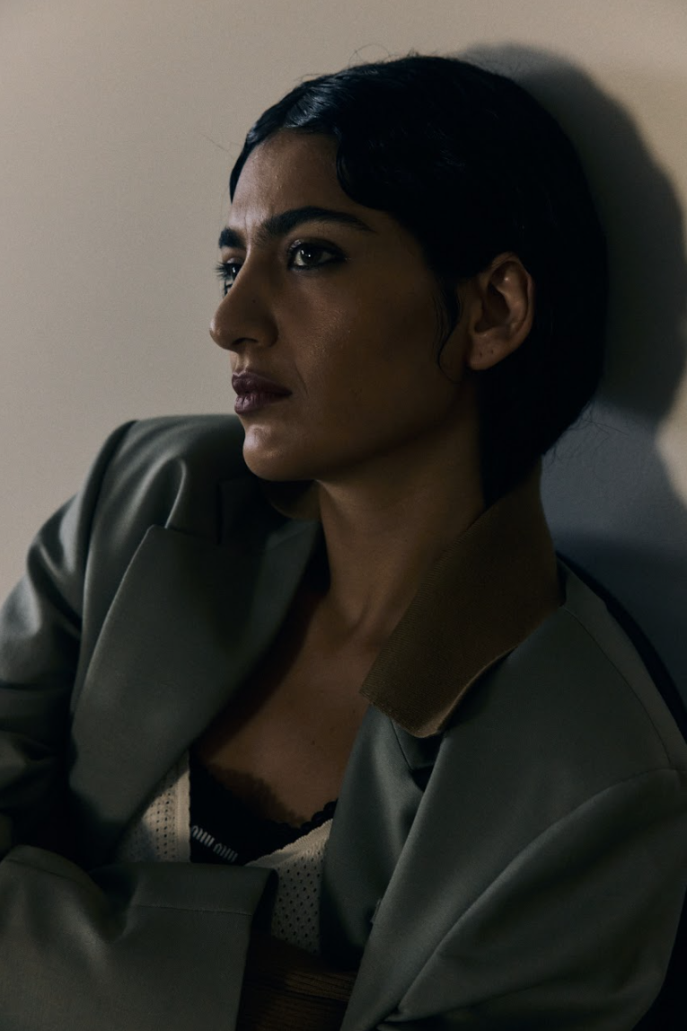 Roxie wears Miu Miu.