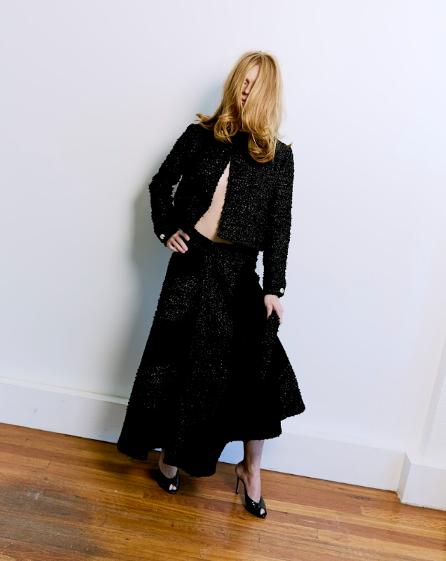 Model wears Loro Piana SS26, Jimmy Choo shoes.