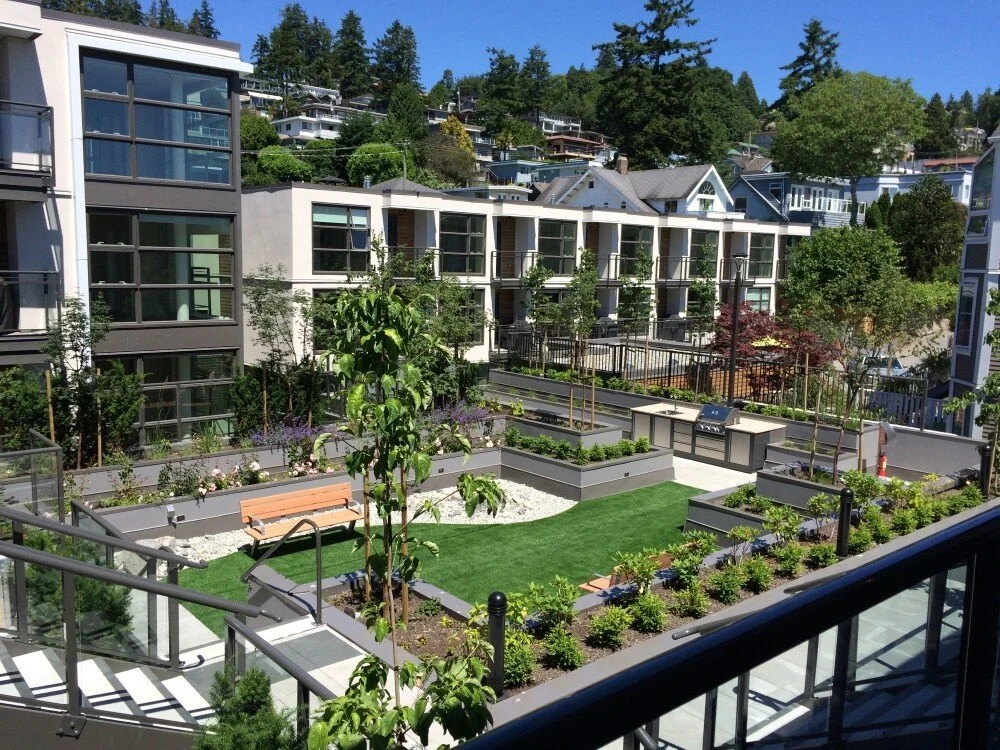 design includes intimate courtyards, a firepit, an outdoor kitchen, and communal vegetable plots