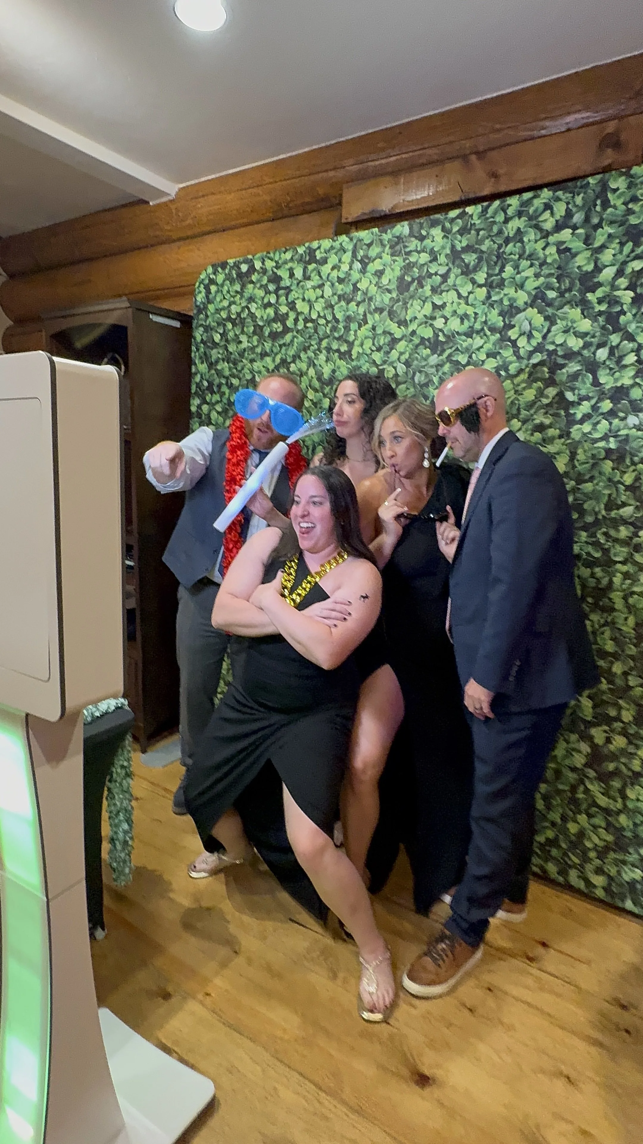 Guests taking pictures in the photo booth