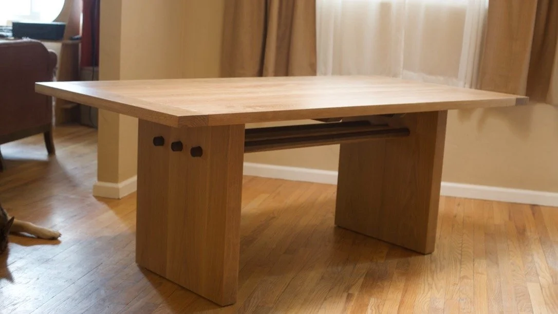 Some better pics of the yet-to-be-named table. I still need to get an endless background setup going and get Friday the dog to stop photobombing my pics. 

The cross-support components are all ammonia fumed white oak and meant to mimic the architectu