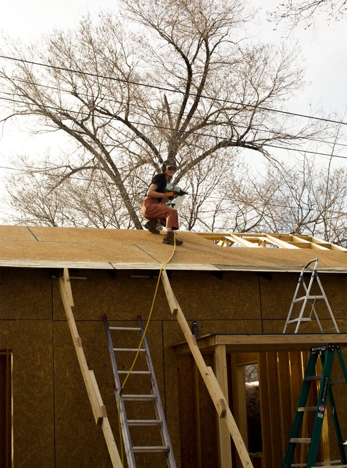 As the owner and lead designer/fabricator at BWW my life is simply too important to do the roofing for my shop. 

Thankfully, my lovely wife is very steady on her feat and great with a nail gun. 

Owning a small business is all about knowing how to a