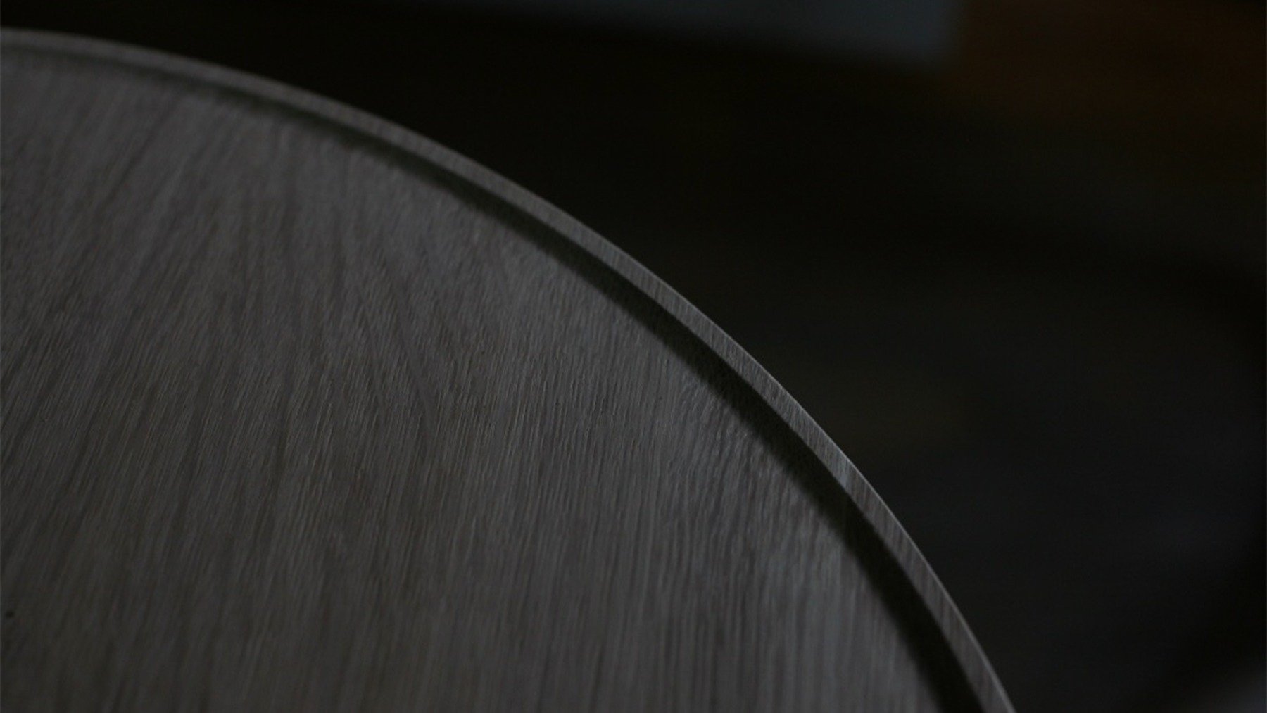 The scooped out profile on top of the new cocktail table was a tricky detail to pull off. Proper wood selection and stabilization techniques made it possible while keeping the top flat. 

I will definitely be revisiting this detail in future builds/
