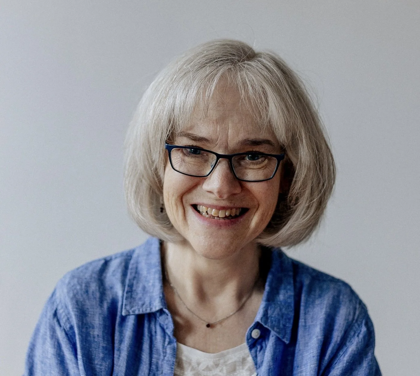 headshot of Jeanette, ready to teach you about bone health, osteoporosis, safe spinal alignment, avoiding fractures.