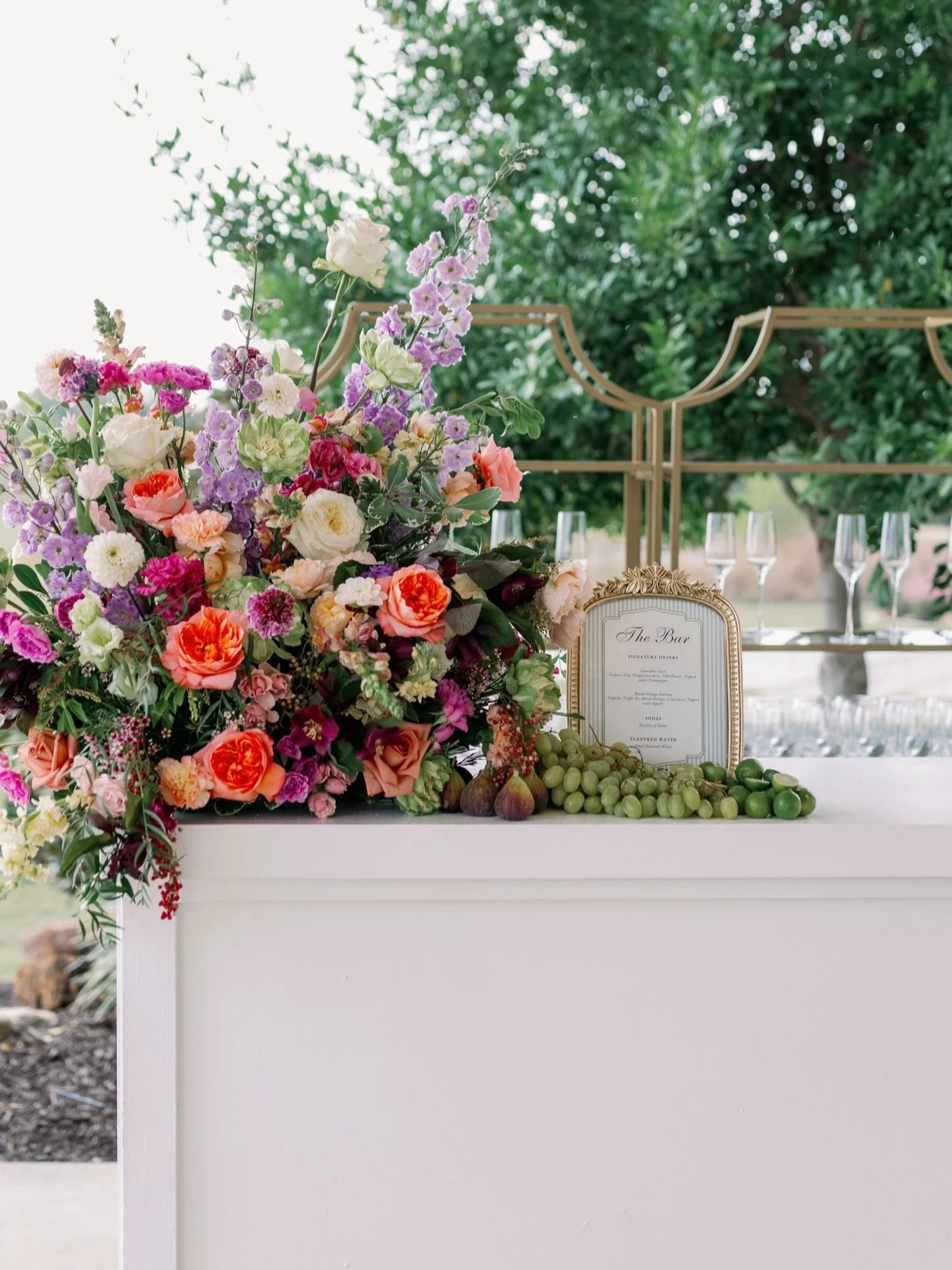 If your guests are going to gather here all night,
it deserves more than just glassware.

Behind The Lens: @kortney.boyett 
Venue: @thenestatruthfarms 

#DFWWeddingFlorist
#HamptonRoadsWeddingFlorist
#LuxuryWeddingDetails
#WeddingBarDesign
#Intention