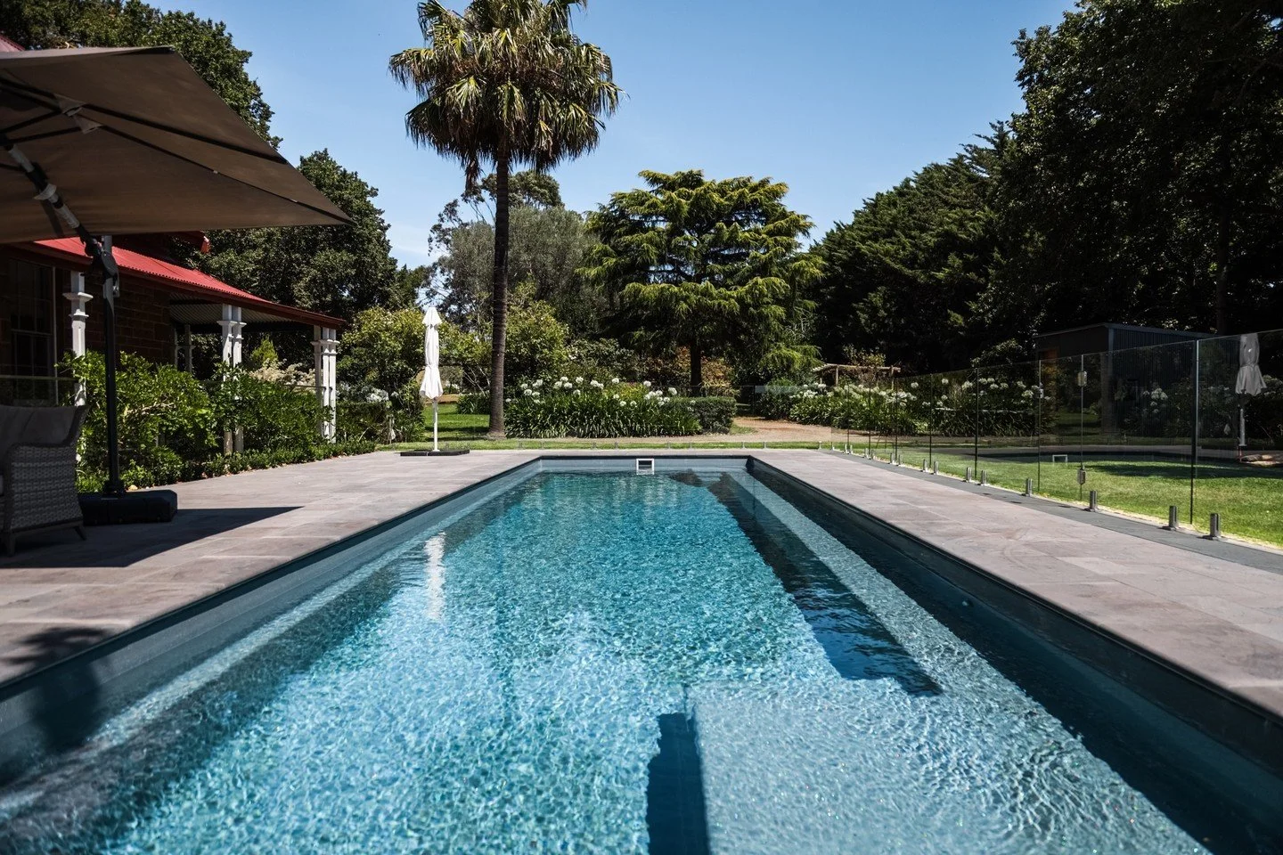 Summer by the Pool in Jancourt. ⁠
⁠
@bamstone_bluestone⁠
⁠
⁠
#mjwalshlandscaping #landscapingwarrnambool #gardendesign #landscapeconstruction #warrnambool #outdoorpools ##beautifulgarden #backyardgarden #gardenloversofinstagram