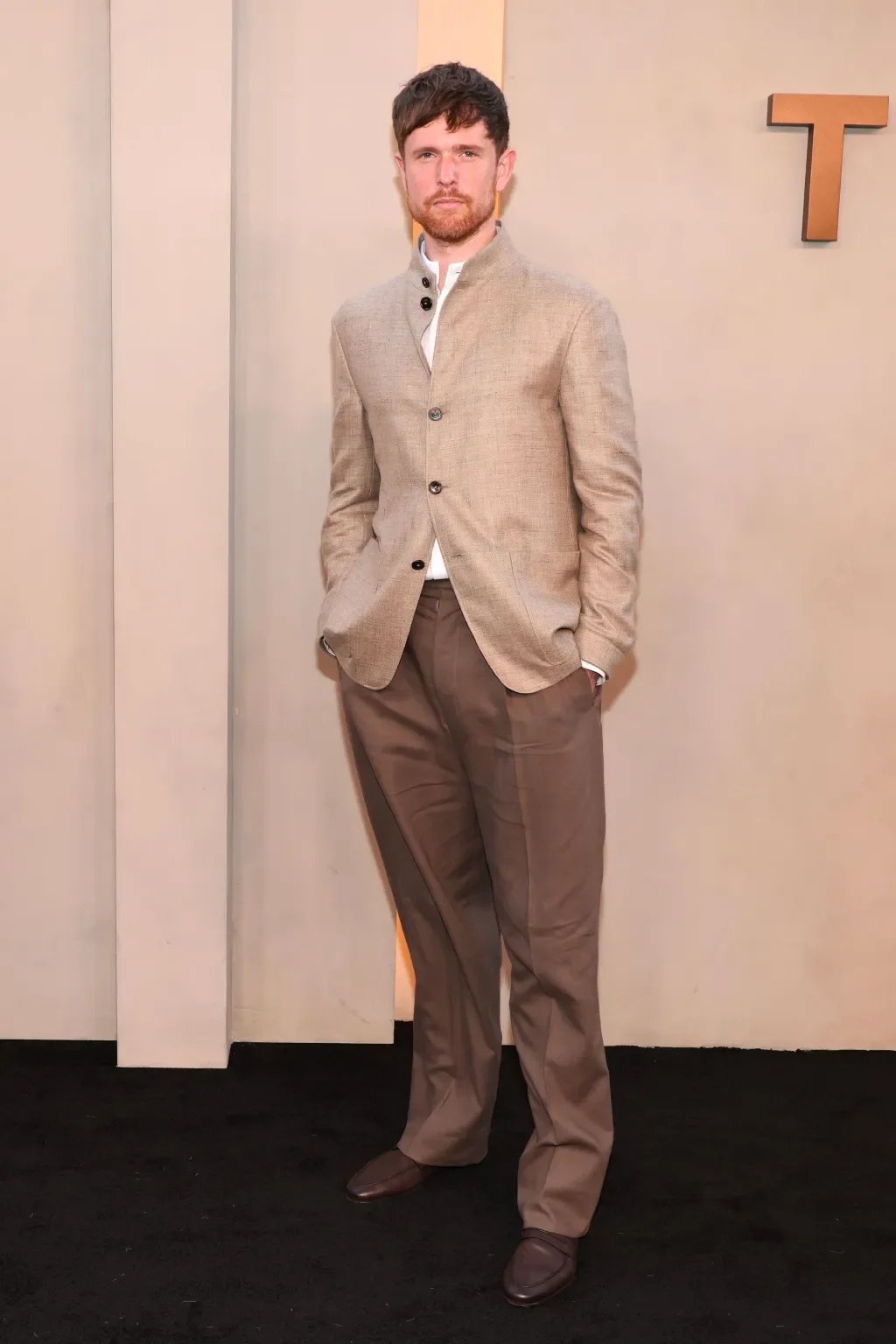 James Blake wearing Zegna. 