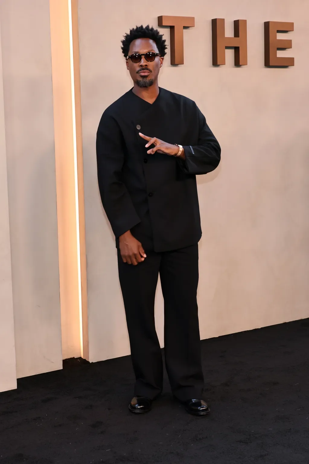 Corey Hawkins wearing Fear of God. 