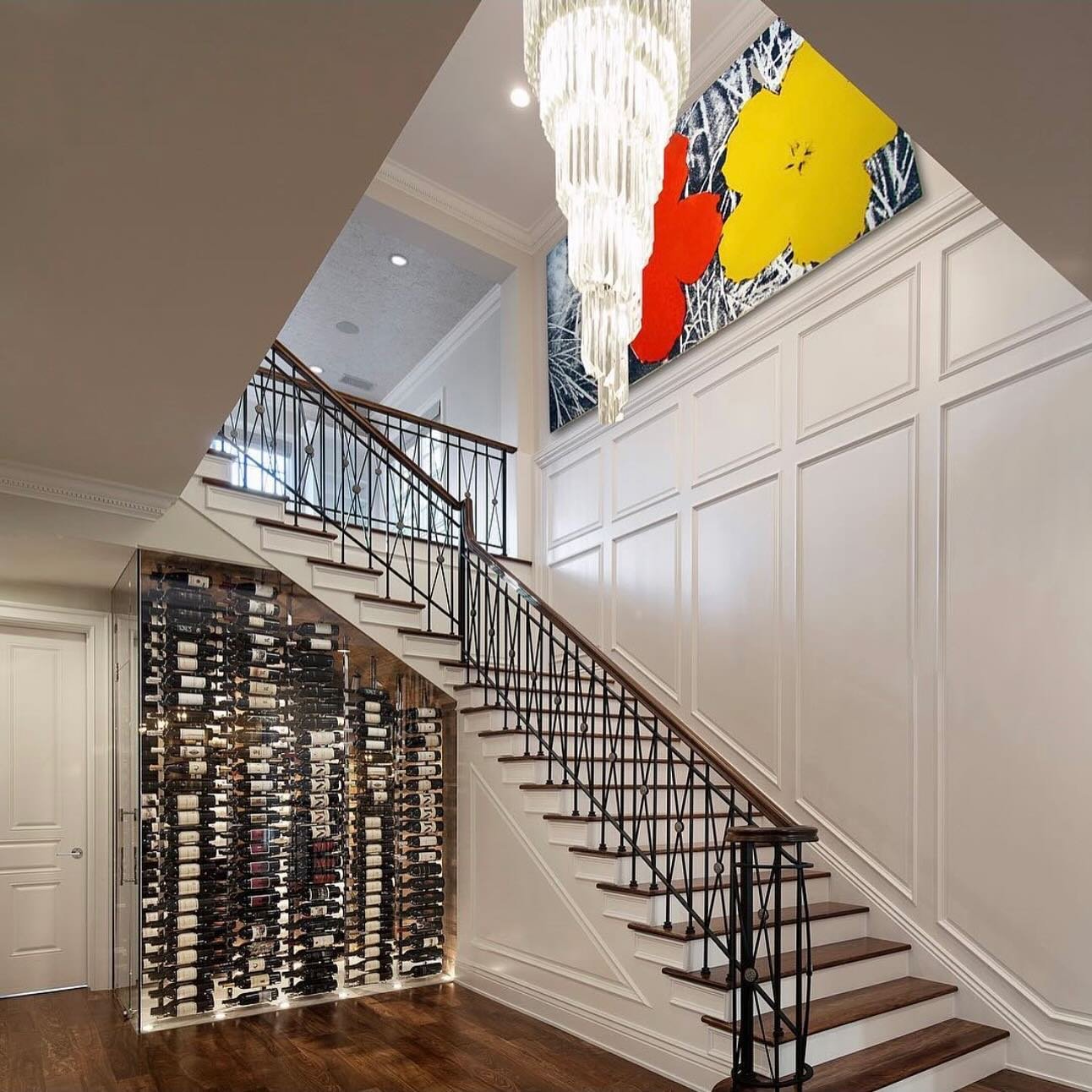 Make your staircase a statement piece! One of our favorite wine cellars that we have done.