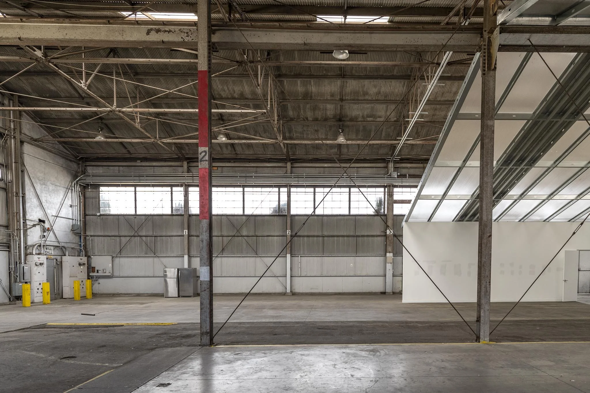 high bay warehouse filming location Los Angeles, warehouse film location 30 foot ceilings LA, 24 foot grid filming location Los Angeles, column free warehouse film location LA, industrial warehouse film location Los Angeles, automotive film location 