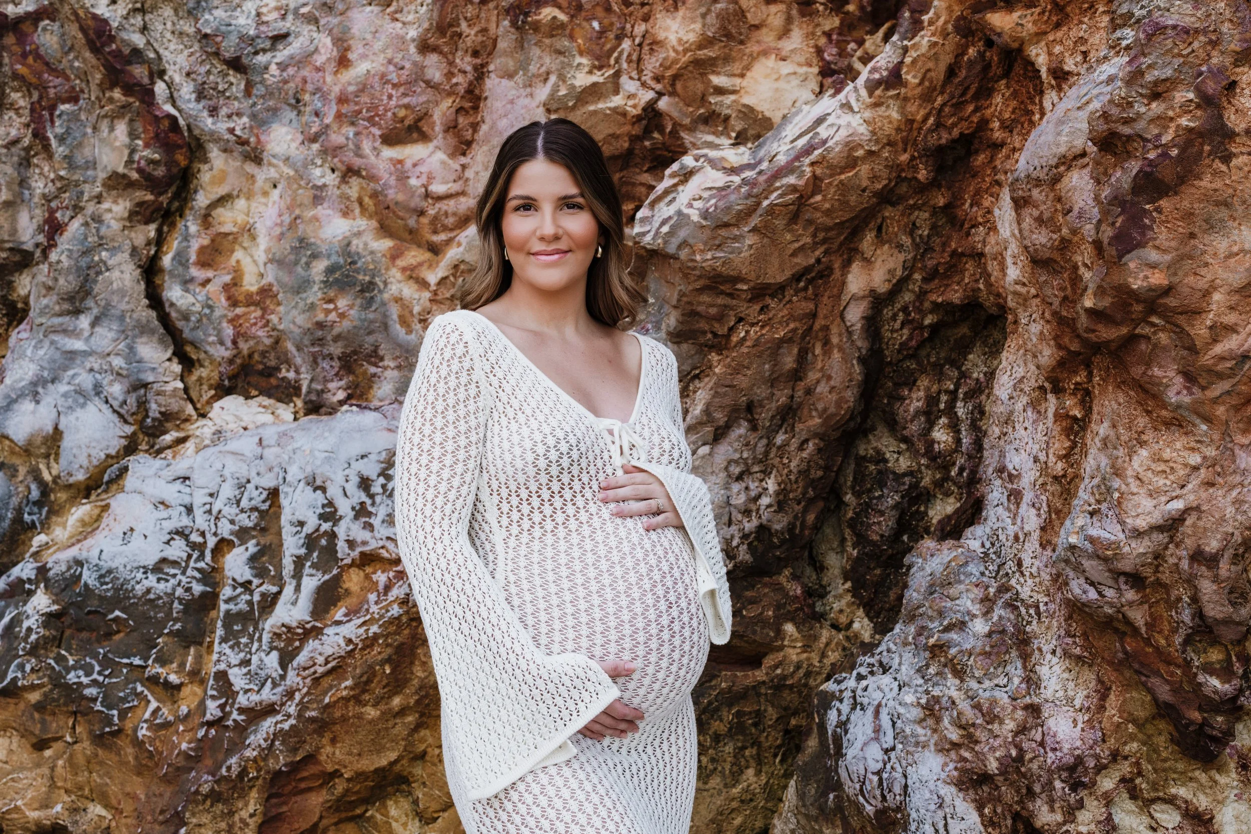 Maternity photographer in Darwin photographing expectant mother outdoors