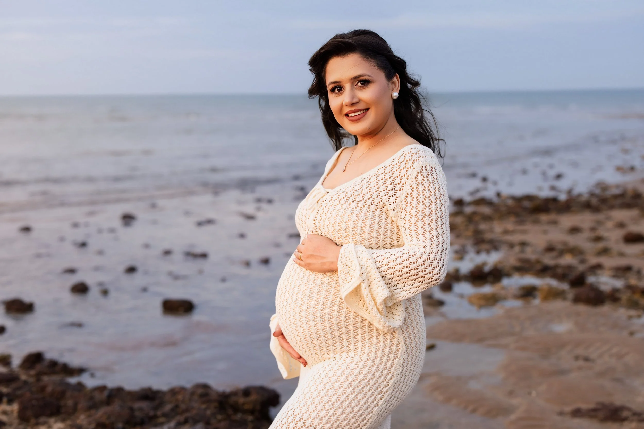 Maternity photographer in Darwin photographing expectant mother outdoors
