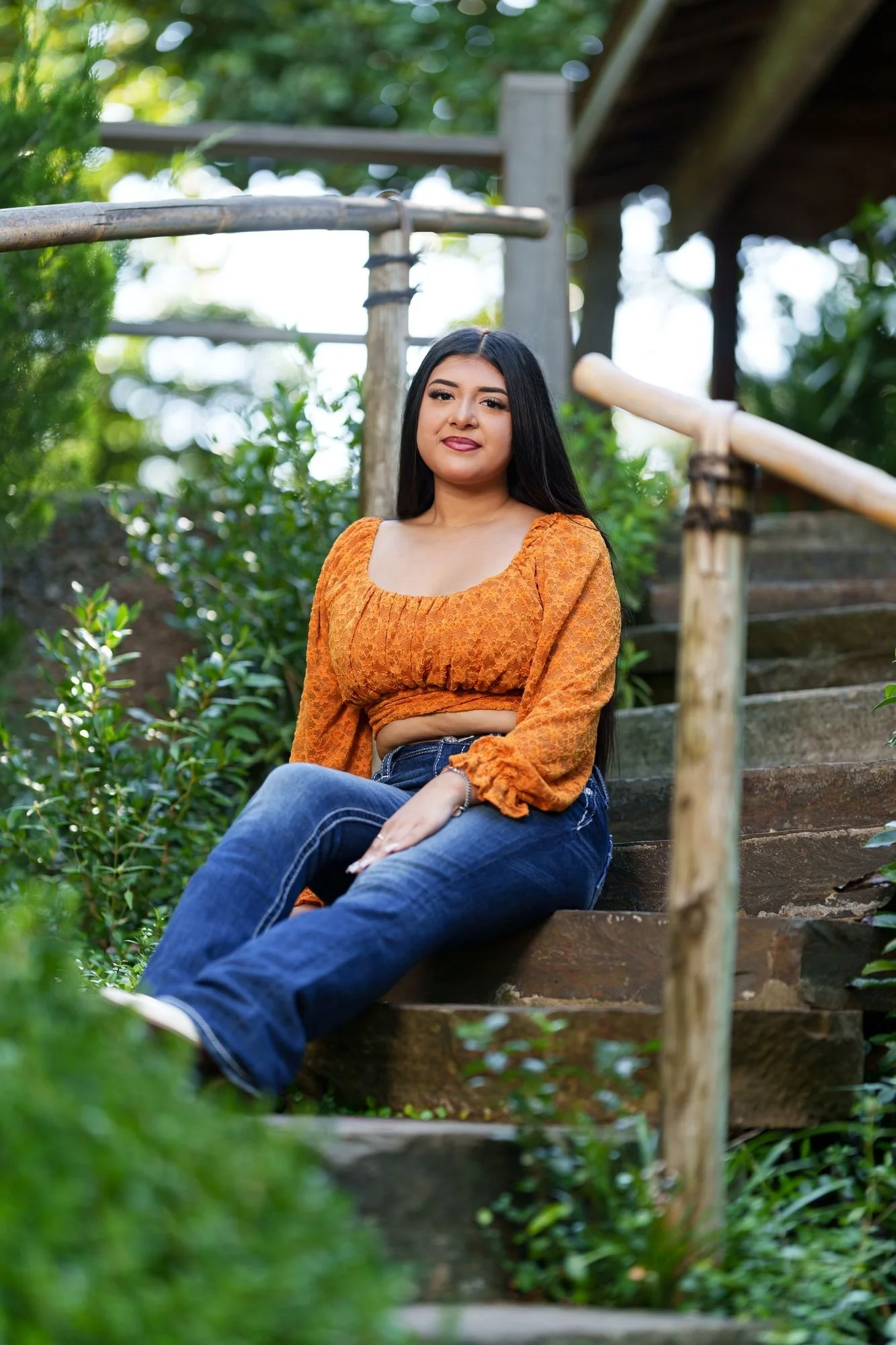 Wide garden frame of Nevaeh's Save the Date quinceañera session at Fort Worth Botanic Garden