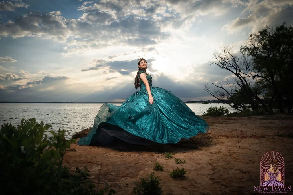  Quinceañera in emerald 3D floral ball gown with sunset rays breaking over Lake Grapevine at Murrell Park in Flower Mound, TX 