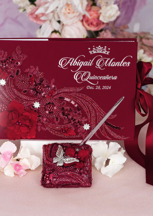 Personalized red quinceañera guest book with matching pen set and floral accents
