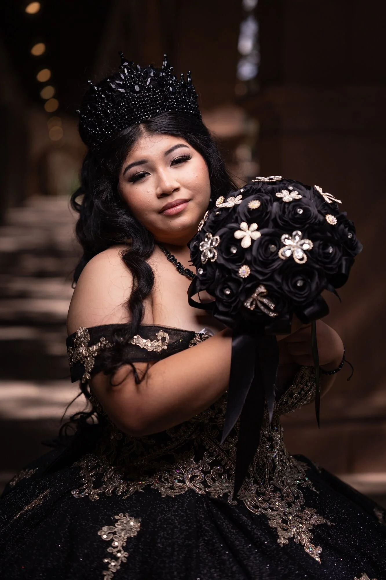 Close-up quinceañera portrait with black rose bouquet at Las Colinas Mandalay Canal preshoot by DFW photographer