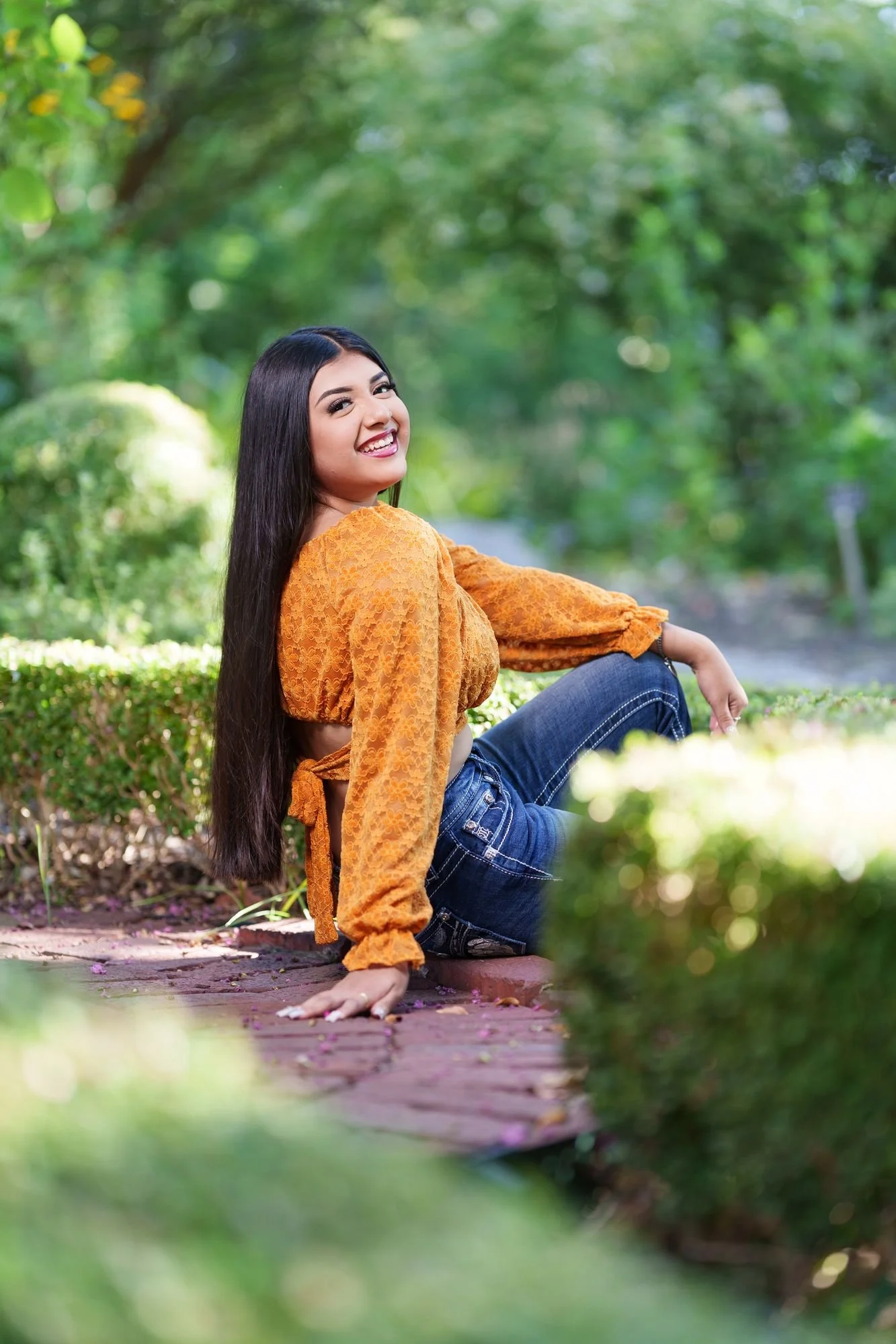 Stepping stone reflection frame at Fort Worth Botanic Garden during Nevaeh's Save the Date quinceañera session