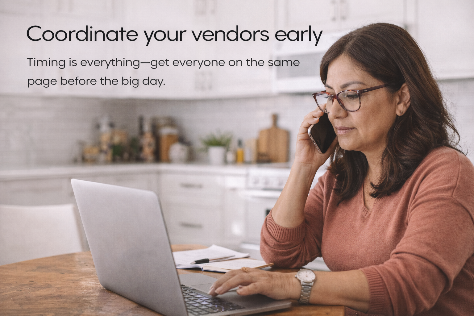 Latina mom planning quinceañera at home, using laptop and phone to coordinate vendors and event timeline