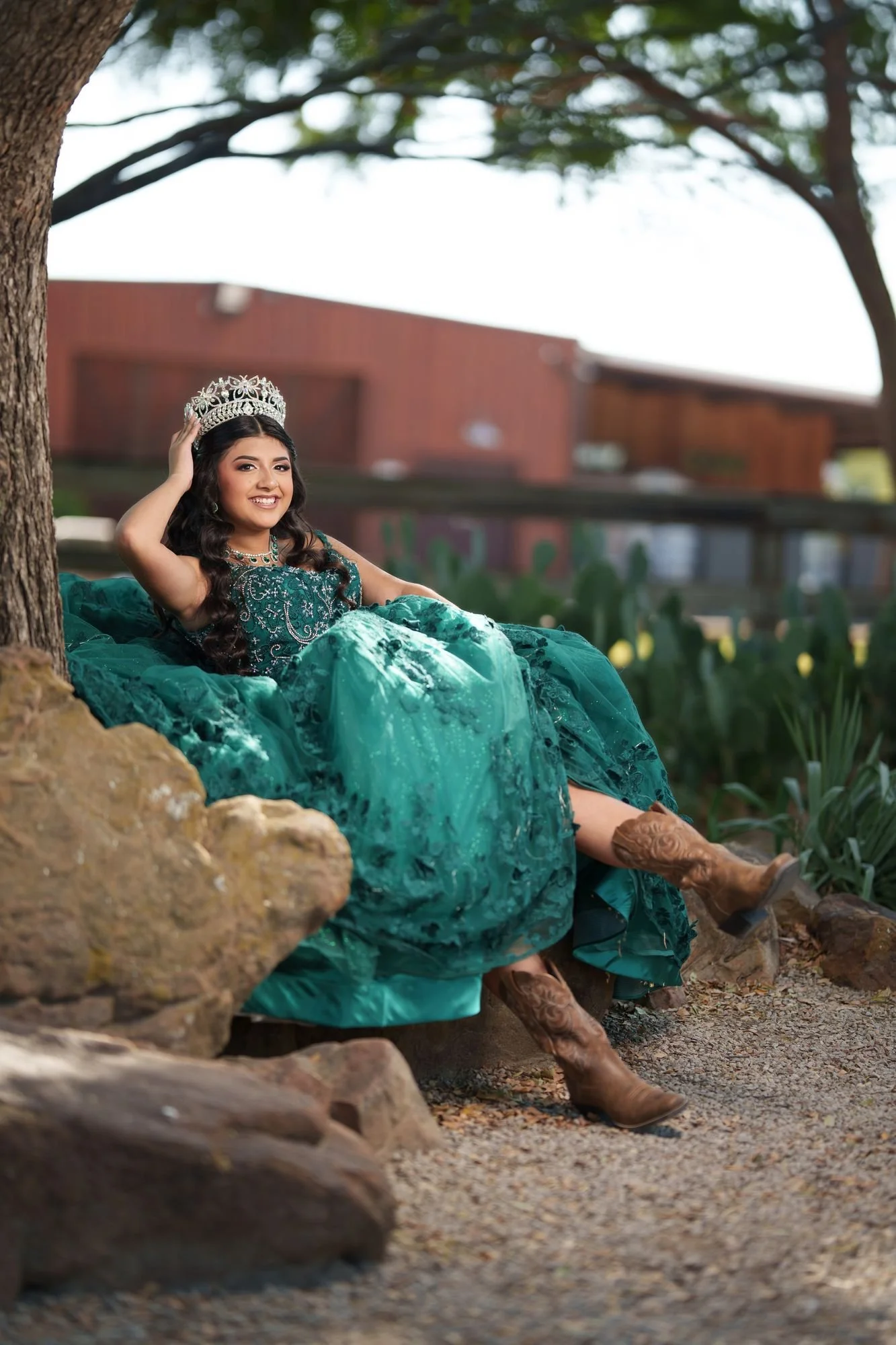 Historic wood facade portrait from Nevaeh's quinceañera formal preshoot at Fort Worth Stockyards