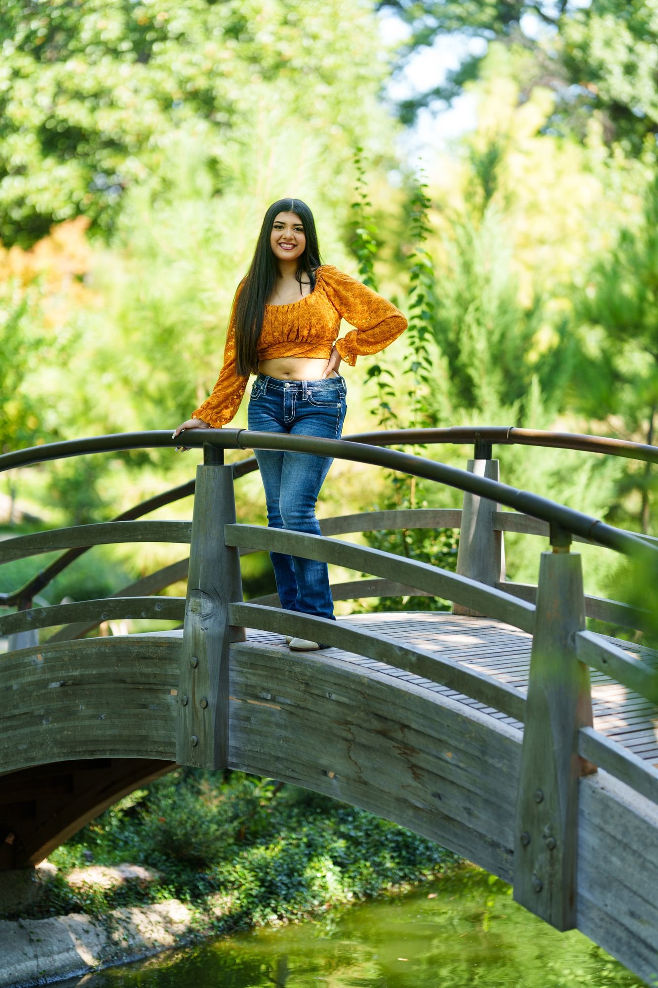 Sunny spring morning portrait of Nevaeh at Fort Worth Botanic Garden for her boho western Save the Date