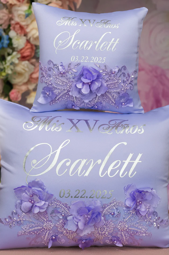Personalized quinceañera kneeling pillows with lavender fabric, floral embroidery, and name and date