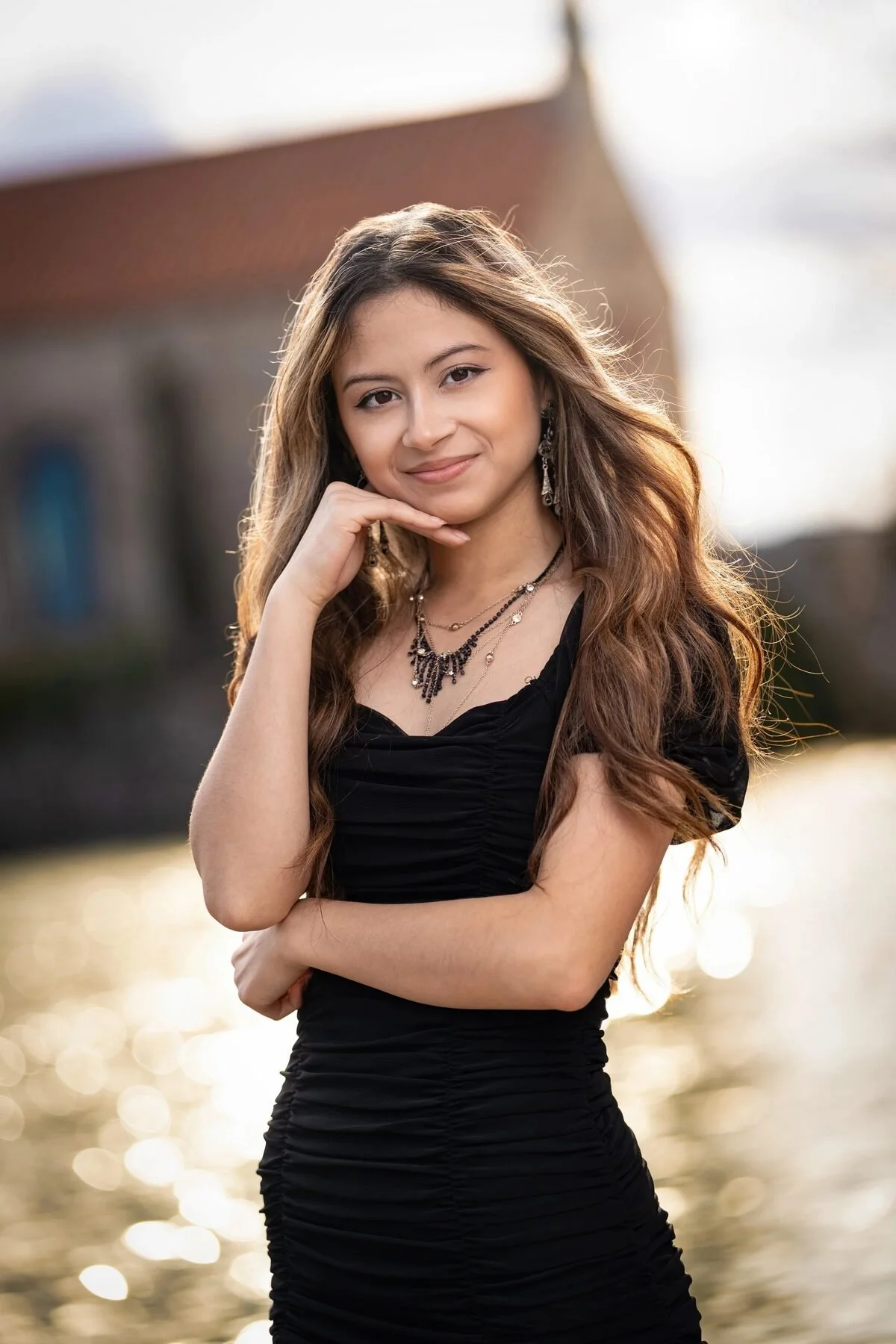 Quinceañera portrait in a black dress at golden hour in Fort Worth