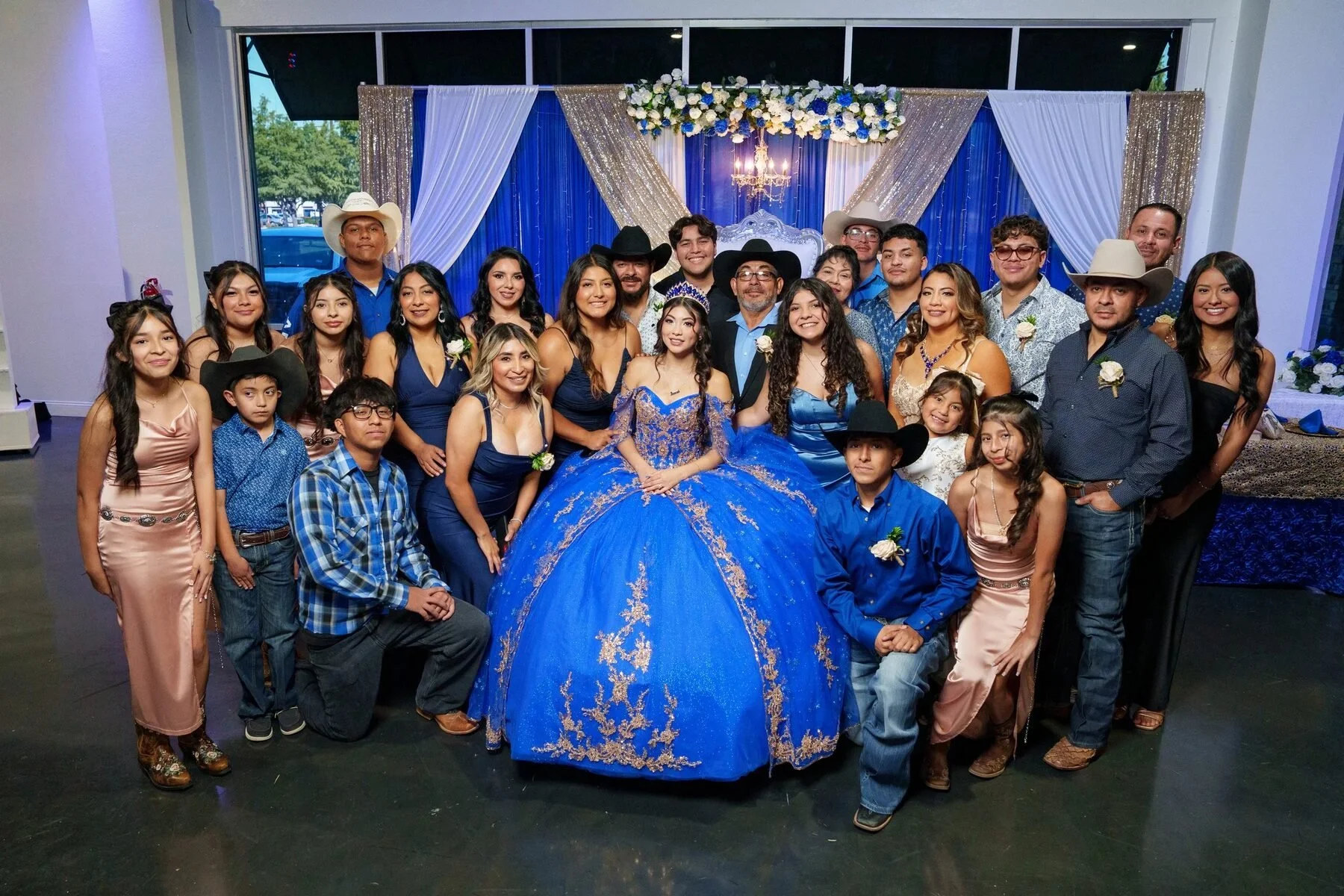 Quinceañera and her family in a group portrait at a Dallas reception