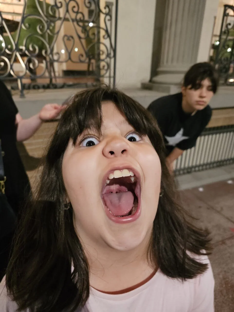 A candid, playful behind-the-scenes moment from the New Dawn Photo team.